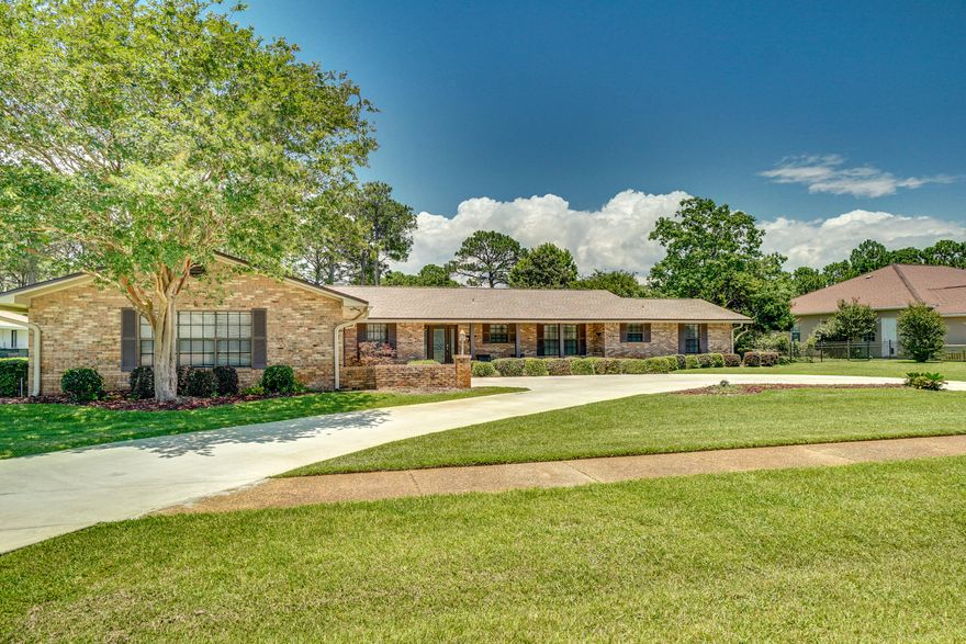 UNDER CONTRACT ACCEPTING BACK UP OFFERS Welcome to Indian Bayou! Beautiful brick home with recently replaced semi circular driveway. This home has one of the largest lots in Indian Bayou. The spacious backyard is a sanctuary with a gorgeous pool overlooking the wooded backdrop and golf course. With 4 large bedrooms, 3 full baths and over-sized two car garage, this home offers the utmost in flexible living. Featuring an eminently livable floor plan, enjoying unmatched quality and comfort--from large dining and living spaces (two cozy fireplaces) that all open to the pool and lanai. Indulge in the home's distinctive living including an open kitchen, screened in porch of the master suite. The Roof was redone in 2017 and both AC units were replaced in 2015.