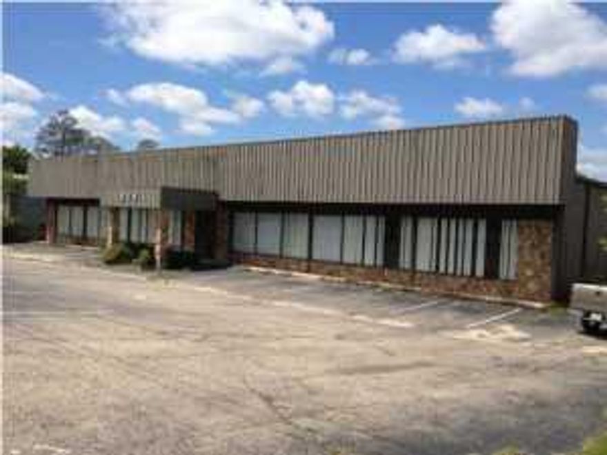 Building has a loading dock, 6 Offices, a Large Conference Room, His and Her Bathrooms, and 20,000 sqft of heated and cooled area and 7000 sqft of warehouse space. All 27,000 sqft is considered warehouse space and conveys a wide open space plan to receive a VARIETY OF LARGE SCALE DISTRIBUTION, OR WAREHOUSE OPERATIONS. Building sits on 1.34 acres of land, offering 24 parking spaces, and has additional land in the rear of the building for additional parking.