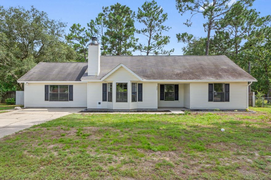 Freshly updated and ready to welcome you home! Enjoy fresh paint throughout, updated ceiling fans, windows, modern light fixtures, upgraded outlets, and a refreshed kitchen with new appliances. The layout offers a cozy living room with a wood-burning corner fireplace, spacious family room, dining area, and convenient inside laundry room. The master suite boasts a bright bay window, with two additional bedrooms perfect for guests or a home office. Relax on the screened back porch, store tools in the shed, and enjoy the large fenced backyard. A new roof will be installed with an acceptable offer before closing, giving peace of mind for years to come. This home blends comfort, charm, and upgrades -- ready for its next chapter!