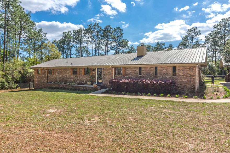 **Back on the Market - thru no fault ofseller** Don't let this beautiful brick home located in the popular Ridge Lake area pass you by! This pristine 5-bedroom/ 2-bathroom renovated home is nestled on 2.3 acres and is within a few-minutes' drive to Crestview High School, Middle and Elementary Schools, as well as, North Crestview shopping. Here are just a few of its wonderful features this 2573 sq ft home offers: metal roof; cozy wood-burning fireplace, granite counter tops in kitchen and bathrooms; spacious open floor plan; luxury hard-wood flooring; stainless-steel kitchen appliances; breakfast bar; covered back patio and a large 2-car carport under roof with overhead storage. New Electric Water heater will be installed before closing.  This gorgeous home also features an EXTRA room with an outside entrance for an office, flex-room or man cave. Your family and loved ones will enjoy the spaciouprivate backyard complete with an above-ground pool and deck  perfect for family gatherings. The backyard also has a 3-year old storage/utility shed with a loft. Come and take a look at this beautiful property today!