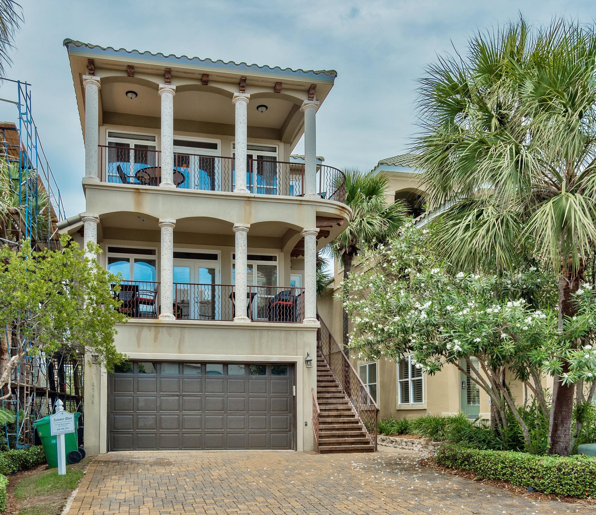 This charming gem is nestled in one of Destin's most desired luxury neighborhoods. This stunning home shows like new with custom features throughout including high end and stainless steel appliances, granite counter tops, travertine flooring, crown moulding, upgraded lighting and hardware, open concept living areas, spacious bedrooms, and much more. The exquisite taste of the builder and designer is evident in every upgrade and every detail in this immaculate property. The kitchen/living/dining area features a fireplace, wet bar, and open flow made for entertaining family and friends. Even views of the famous Emerald Gulf are visible from the spacious balconies on this mediterranean marvel. Privacy and elegantly landscaped backyard comes complete with a hot tub and the serenity befittin