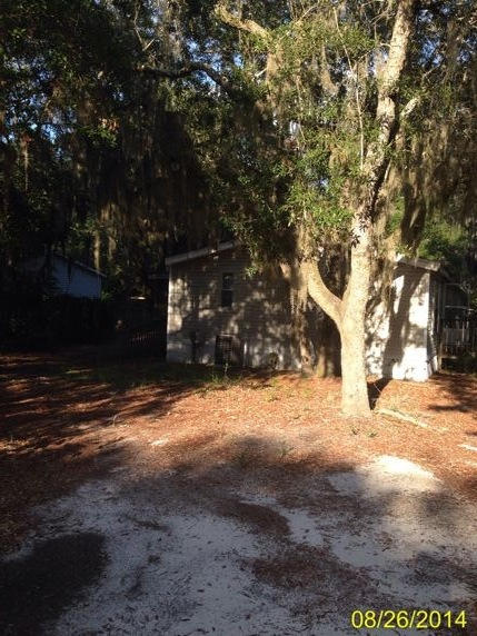 Awesome opportunity to own in the Santa Rosa community. This is a 3 bedroom 2bath mobile home on a beautiful corner lot. There is a huge screened in porch on the home. With a little TLC this would make a nice home or rental.