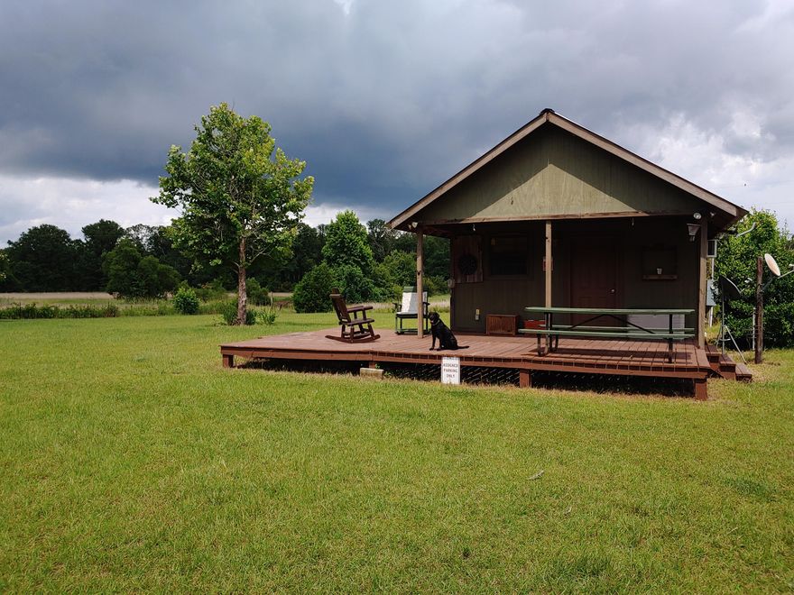 Beautiful farm acreage and hunting camp. Property consist of 105 acre's surrounded by swamp area. There is a hunters cabin, pole barn and shed. Great for duck and deer hunting. Land consist of cleared acreage, planted pines, wetlands with a fish and duck pond.