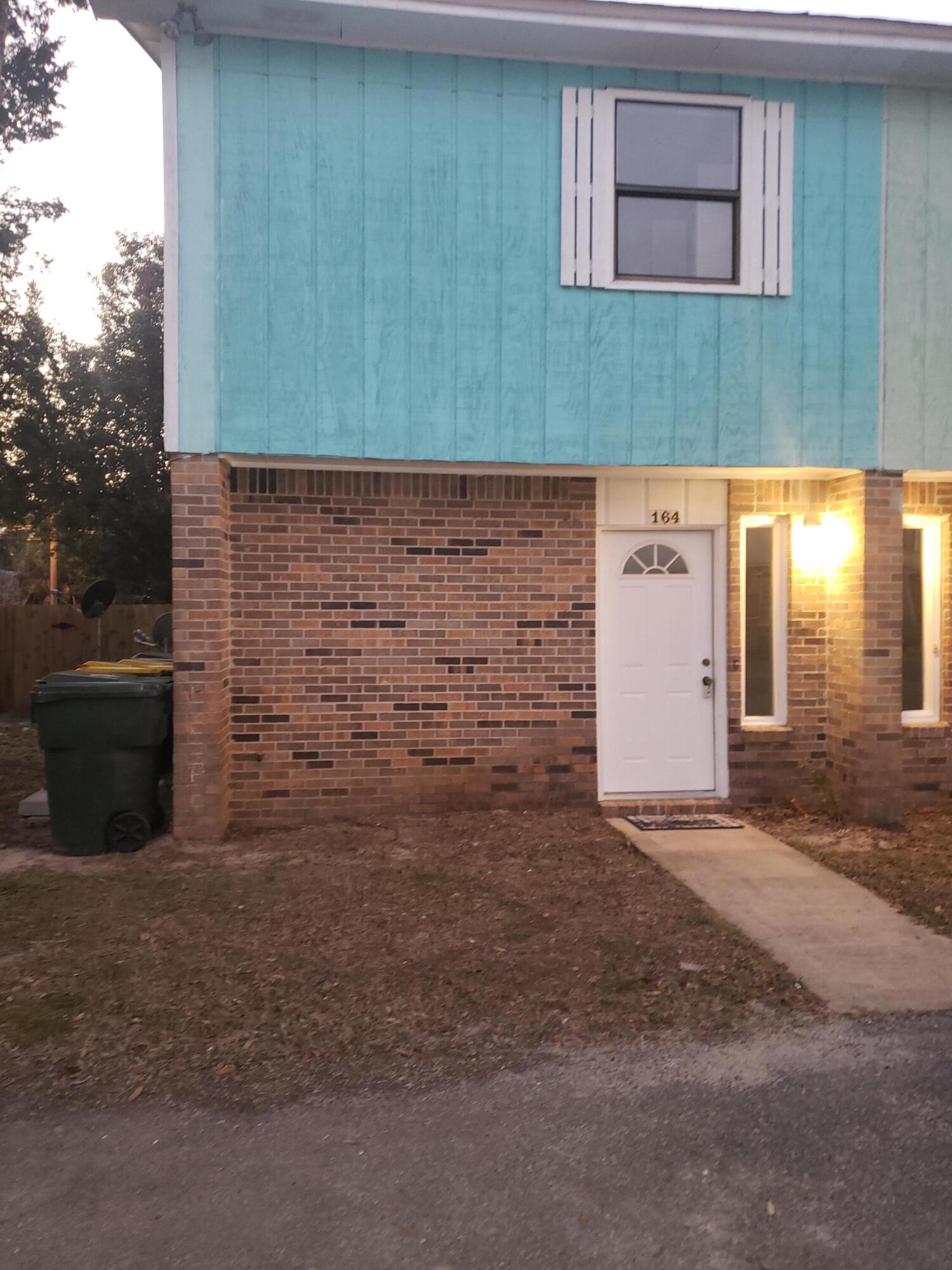 This home is centrally located to ALL the amenities that the beautiful Coastal City of Fort Walton Beach has to offer including walking distance to Okaloosa Island, Library, Convention Center, shopping and dining, etc. Fort Walton Beach is growing exponentially. You will never run out of things to do on the Beautiful Emerald Coast! Conveniently located between both Hurlburt and Eglin Air Force Bases! The backyard has a gate that allows access from the street and there is additional storage off the patio. The 2 bedrooms are located upstairs along with the full bath with separate shower. Master Bedroom has double French doors that open up to a balcony that overlooks the fenced back yard. New Roof 2021. Call for your showing today! Awesome investment or first-time.