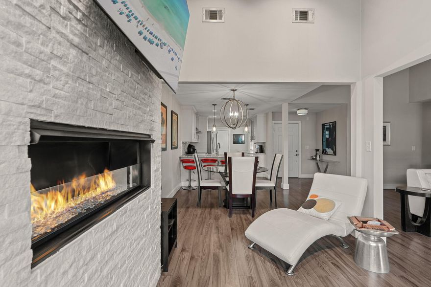 PROFESSIONAL PHOTOS COMINGA remarkable opportunity to purchase a renovated, ONE LEVEL, 3-bedroom home  within Sandestin! Artfully renovated and enlarged  for spacious entertainment/living, generous storage room and a quiet location near the community pool.  An abundance of natural light through the new picture window  overlooking the 1st hole of the Links GC with Bay views beyond. A shaded, private patio area, cozy propane fireplace inside and golf cart parking/charging directly in front. Never been rented, meticulously maintained and ready for you! Seller is offering a $10,000 Buyer credit towards closing costs, furniture or what you might imagine! Sandestin Golf and Beach Resort features more than seven miles of beaches and pristine bay front, four championship golf courses, 15 world-class tennis courts, pickleball courts, 108 catch and release ponds stocked with bass (no fishing license required), a 226-slip marina, a fitness center, spa and celebrity chef dining. Shop, dine and play at the charming pedestrian village, The Village of Baytowne Wharf and more. Inside the gates of the resort, residents of the 72 distinctly different neighborhoods enjoy a balanced lifestyle of high-class living, spanning 2,400 acres from the beach to the bay. There are just over 4600 properties within the gates which offer 24 hrs./day gated security. Everything within the gates of the resort is accessible by golf cart or bicycle. The entire resort is interconnected by miles of pedestrian, bike and golf cart paths that weave through groves of live oaks, meandering past natural lagoons, fountains, man-made lakes, and meticulously landscaped fairways.
Just beyond the gates, Grand Blvd with its weekly farmers market, varied events and superb section of dining and shopping is readily accessible by golf cart. The Market Shops, on the south side of highway 98, boasting more dining and shopping choices, is easily accessible utilizing the tunnel beneath Hwy 98
