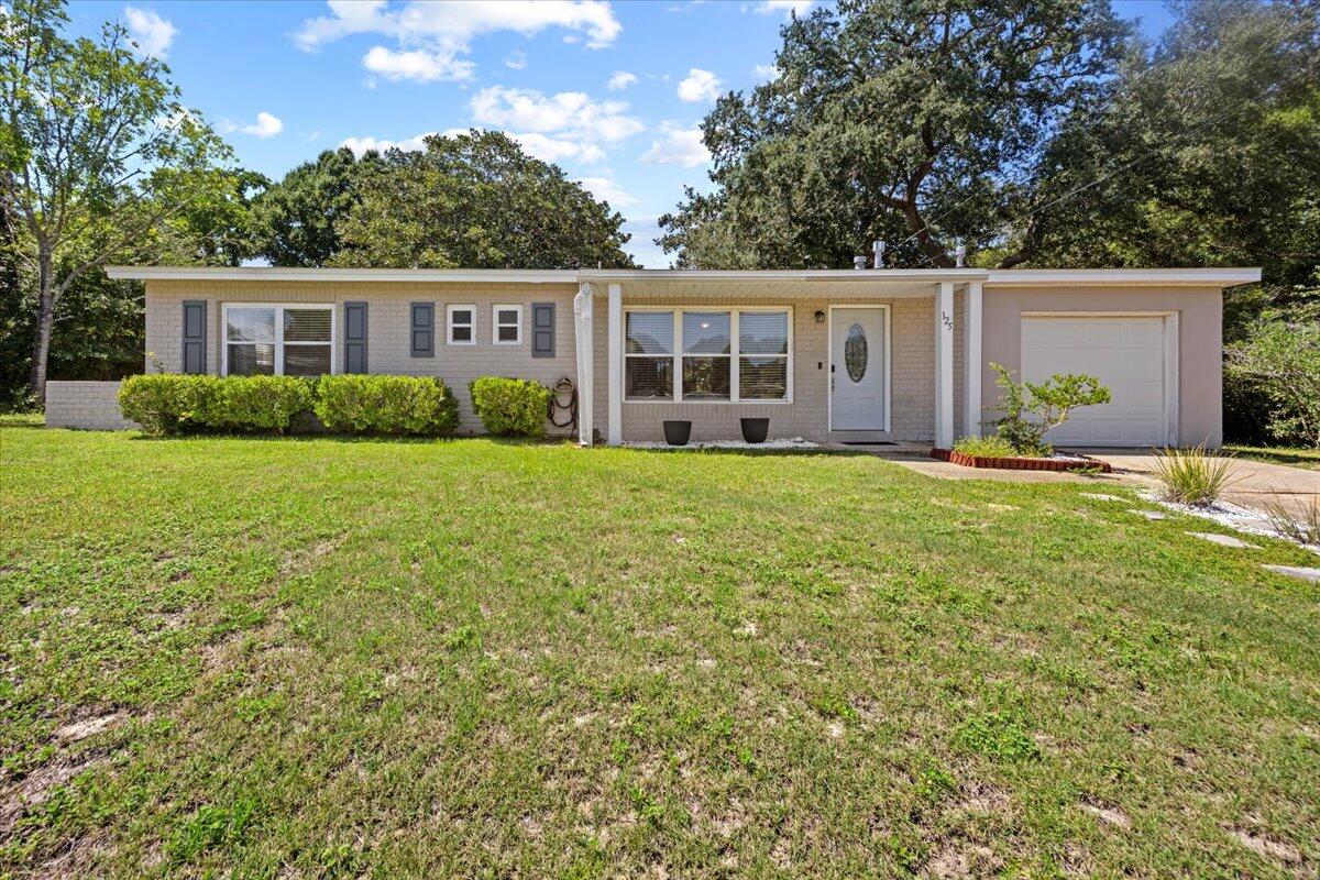 Come see this turnkey, investment-opportunity with a proven AirBnB history and no HOA! This renovated, 3BR/1.5 Jack and Jill bath cottage has fine finishes, updated flooring, appliances, bathrooms, tile, kitchen and a 2021 roof and 2024 water heater! Features include a serene, screened-in porch with a large, private, fenced backyard awaiting you, your family and or renters and guests to enjoy grilling and other yard activities. Regardless of your plans for this fine home, opportunities abound! With plenty of parking and closet space, including an owner's closet, this adorable home also has a primary suite with private bath access. Conveniently located just minutes away from Hurlburt Field, shopping, and beaches, this home is also perfect for new buyers and empty nesters!