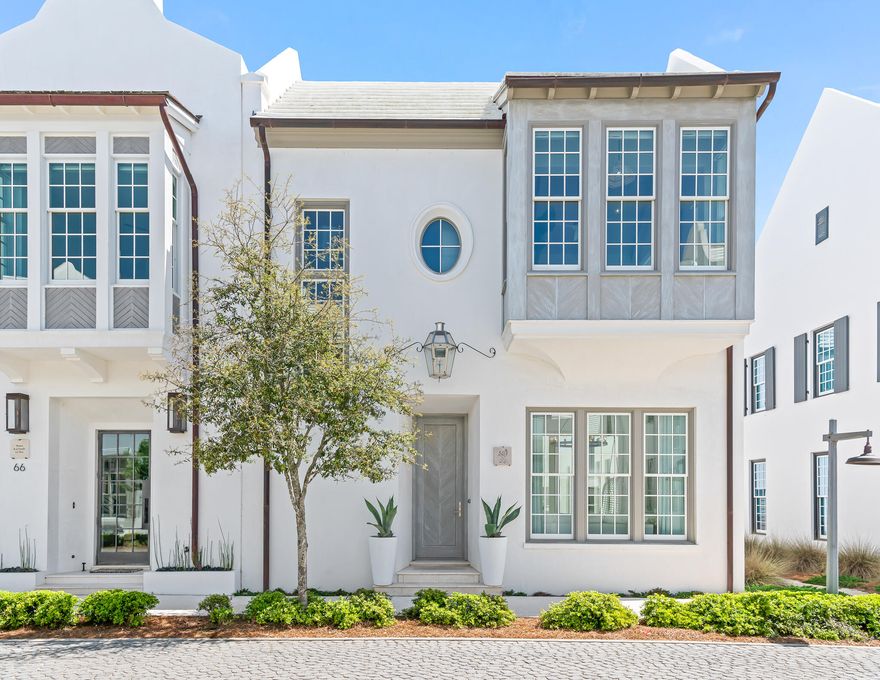 Reflecting the best of the Alys Beach lifestyle, this Domin Bock designed courtyard home seamlessly connects spacious living areas to the private open air courtyard. Large folding window walls open from the living, dining and kitchen areas to the generous courtyard where an inviting dipping pool and fountain create a dramatic backdrop for gatherings or serene downtime. This corner homesite bordered by a pedestrian path, provides beautiful streaming light on three sides and adding to its appeal is the close proximity to the breathtaking and award-winning Caliza Pool and ZUMA Wellness Center. An open floor plan on the first level includes the Living room, Powder room, Dining, Kitchen and Laundry. A much-desired two car garage is incorporated into this home. Top of the line appliances have been chosen for this cutting edge beach home. Understated elegance describes the fixtures and finishes chosen for this beach home such as quartzite, Venetian Plaster, honed marble and mother of pearl tile.
The second level welcomes you into a flex room with vaulted and beamed ceiling with Pecky cypress. This room can be utilized as either a den or large bedroom with private bath and bay window. Guest bedrooms two and three each have en suite bathrooms and generous windows overlooking the pool /courtyard. Beautiful honed marble and quartzite accent these baths. The spacious Master bedroom with Venetian Plaster has a vaulted ceiling with beams as well as a sitting alcove. The Master bath offers a free standing soaking tub surrounded by herringbone mother of pearl tile wall, marble tiled shower, marble double vanity and large walk-in closet.

