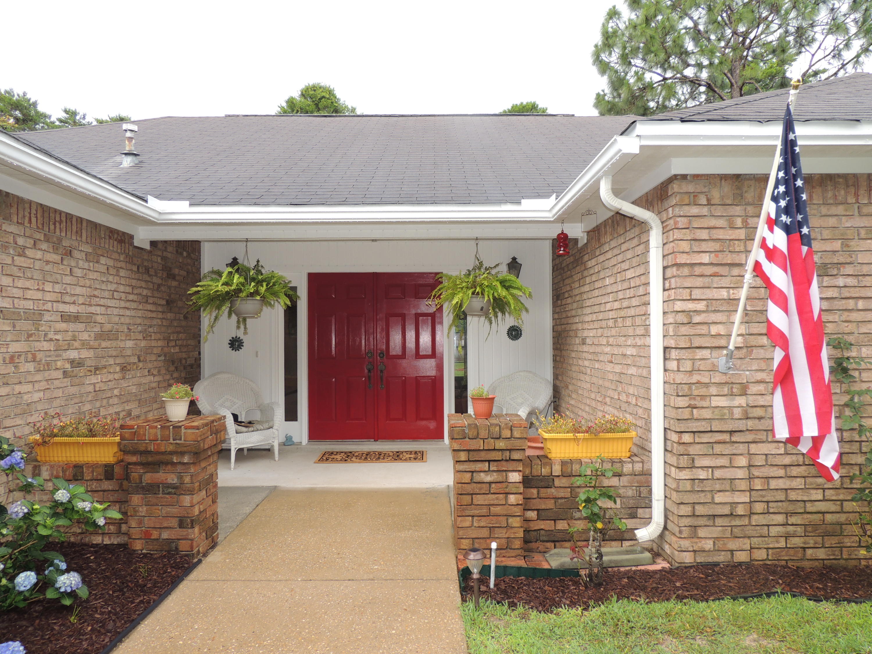 Beautiful Brick with curb appeal, single level home with gorgeous landscaping! This 3/2 has a completely remodeled kitchen with granite countertops, tons of cabinets, and pantry space with room for kitchen table.The kitchen opens into a formal dining room with a French door that open to large back patio. The living room has fireplace wood mantle and is quite large. Two coat closets (one each side of front door) for convenience and tons of storage throughout. Other features include new garage door, sprinkler system with well, gas is at the house, and the backyard is lush, green, with grapevines, fruit trees, and a huge shed with ramp for all your toys and yard stuff. This house is close to all the BWB amenities and seller is offering a home warranty! Come check it out~!