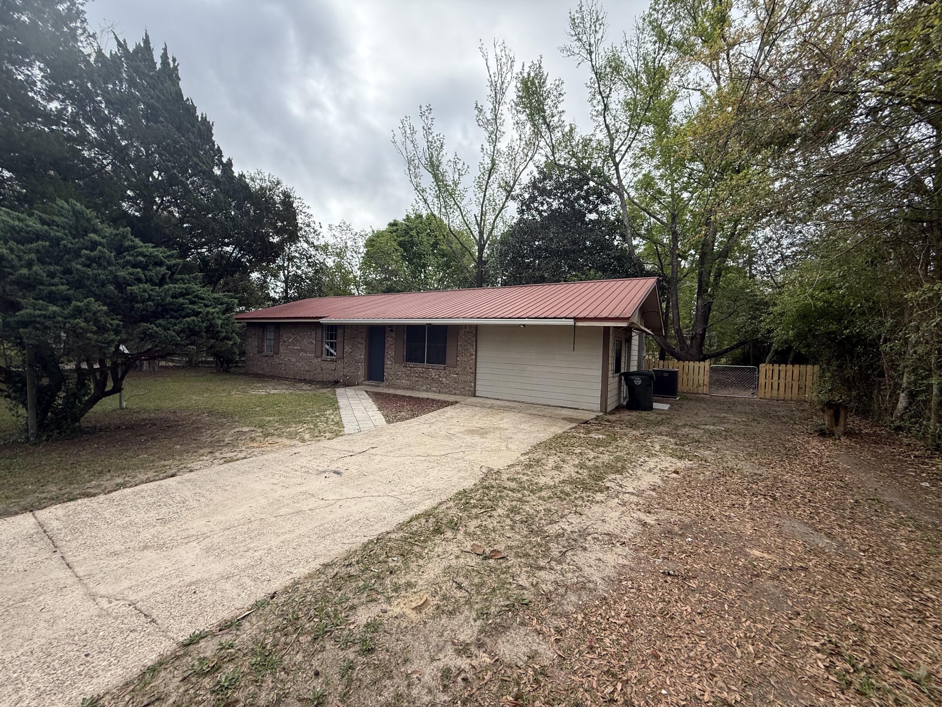 Perfect family home! Oversized master bedroom with sitting area that could double as office or exercise area! Beautiful fenced backyard; Newly renovated, new paint, vinyl flooring throughout, covered back patio, washer/dryer hookups and ceiling fans!