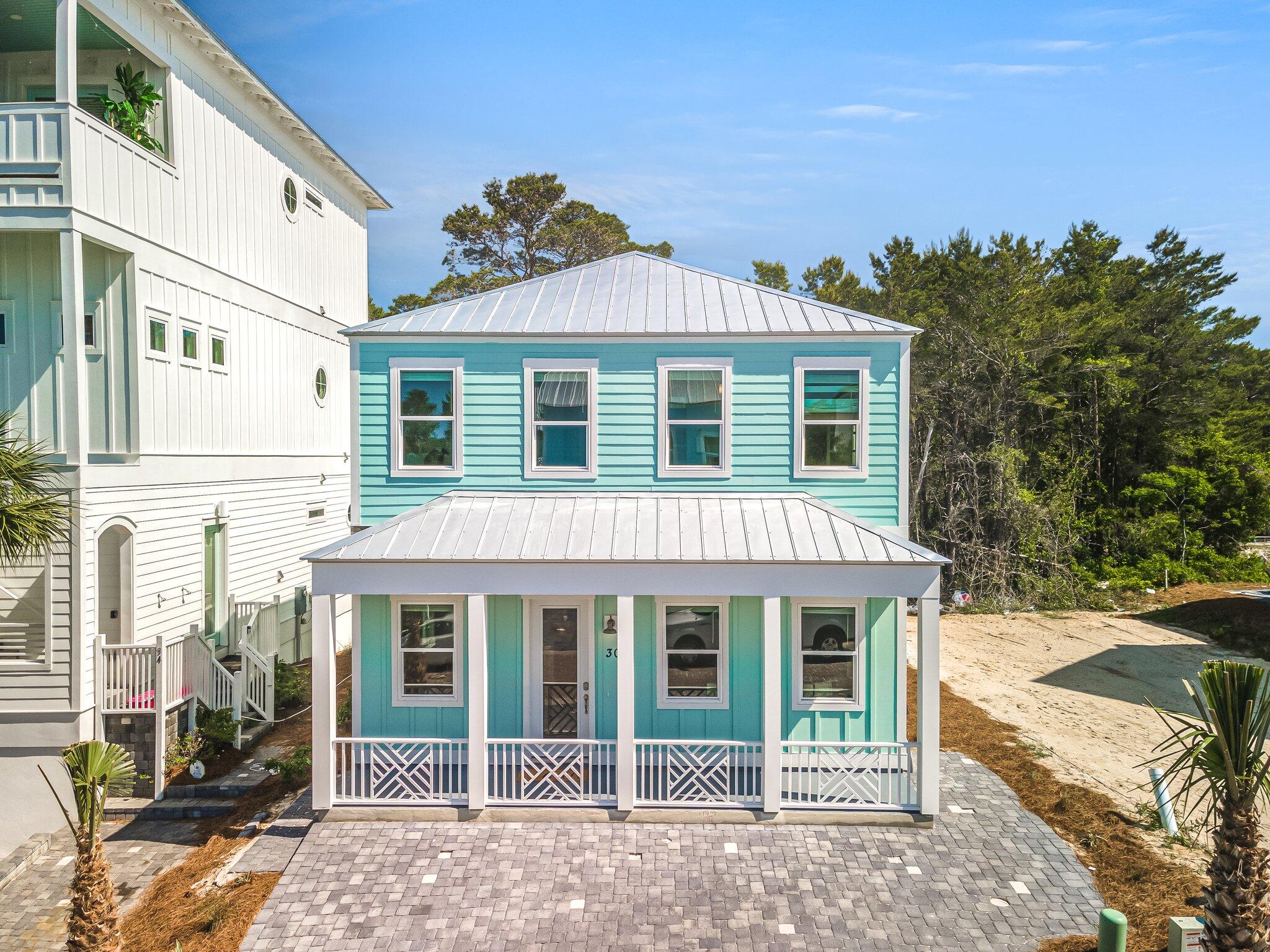 This beautifully decorated, turnkey/rental ready home in  Serenity at Dune Allen is ready for summer. Short distance to Dune Allen Beach access. Just completed in 2022, professionally decorated with no detail spared. Perfect for the whole family with a first floor king bedroom and bunk room followed by two additional king bedrooms and a bunk loft on the second floor. Each bedroom with its own full bathroom. This house is being sold furnished.