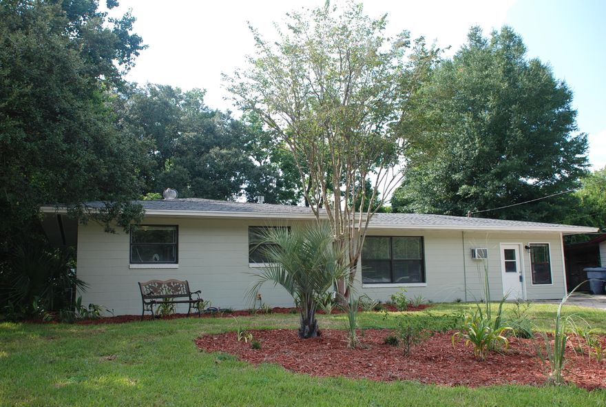 This home has almost been completely remodeled and feels like a much newer property. Recent updates include new kitchen cabinets, butcher block counter tops, stainless steel Frigidaire Gallery appliances, tile floors throughout, new light fixtures, new bathroom vanities, renovated master bathroom, new hot water heater, all new base boards, new doors and door casings, plus fresh paint inside and out. In addition, the hot water heater was replaced in 2015. The yard is large with new landscaping and a storage building in the back. The oversized driveway leads to a back yard perfect for a boat, jet ski or motorcycle. This property is a must see!