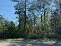 Walking distance to the public boat launch & just 4 miles to the beach! This affordable, wooded corner lot is just 3 blocks from Cessna Landing park & public boat launch, so you can jump in your boat and quickly be on the Bay. The gorgeous beach, and Gulf Place 30A, with all its amazing events & restaurants is just 4 miles down the street. With NO HOA fees, and NO build out time, start living the boating & resort lifestyle you've always dreamed of. The adjacent lot is also available and both lots can be purchased for $75,000.
