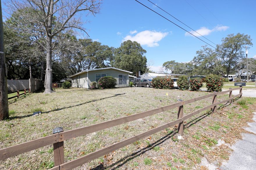 GREAT First Time Home Buyer Opportunity  or INVESTMENT PROPERTY! 
You must see this clean, well maintained home convenient to the hospital, schools, shopping and the beach. , this 3 bedroom 2 bath house with 2 living areas as well as an enclosed Florida Room. The large, tree shaded yard is completely fenced and comes with 2 storage sheds. There is a well-fed sprinkler system to keep the lawn or your garden looking green. Split bedroom plan with the 2 additional rooms in the front and the Master Bedroom in the back. Spacious open Kitchen with a Stove/Range and Dishwasher. Inside Laundry Room.**PROPERTY BEING SOLD AS-IS**