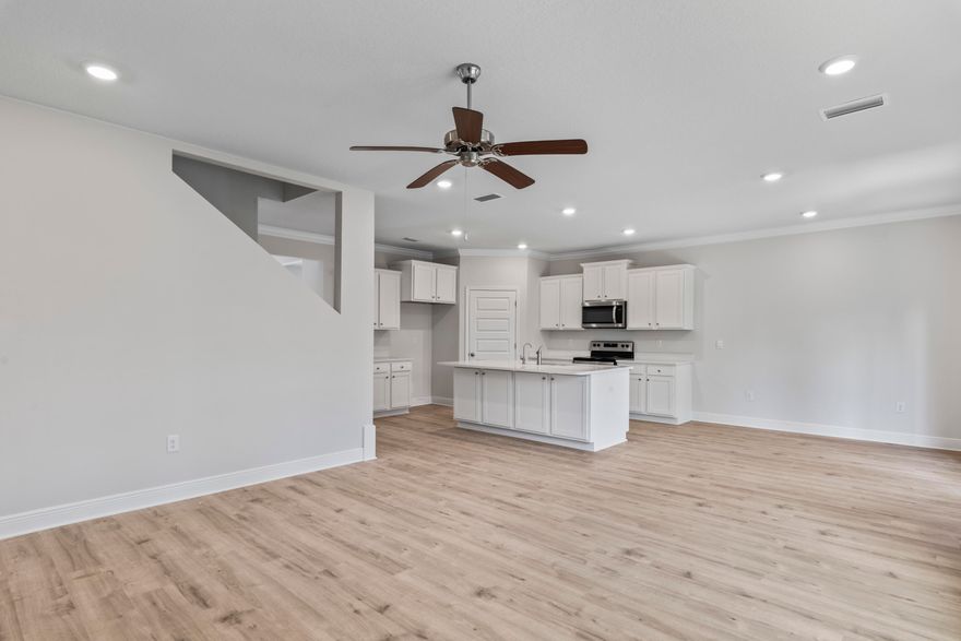 Limited Homesites Remaining! New construction at Live Oak Harbor located in Freeport, Florida. This beautiful new community features heavily wooded lots, Less than half a mile to the Freeport Marina and on LaGrange Bayou. This community is perfect for anyone who wants to enjoy the benefits of living by the water with the feel of a private neighborhood. The 'Carol' plan features a spacious back porch, Hardie siding, 9' ceilings on the first floor, 8ft on the 2nd floor, EVP flooring, Ivory shaker style cabinetry in the kitchen and bathrooms, quartz countertops, and a modern tile shower.  This energy efficient home offers 'Home is Connected' Smart Home package, DEAKO switches, 1-year builder warranty and 10-year structural warranty.