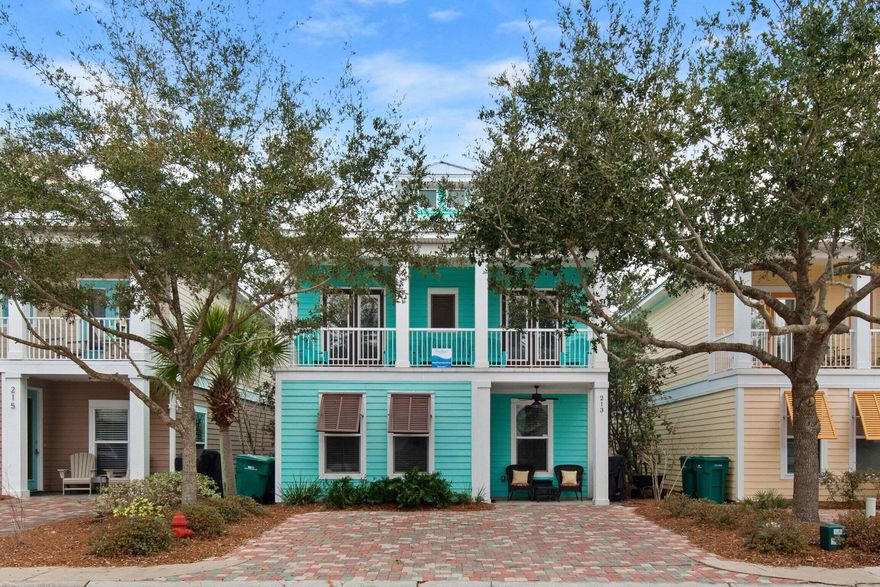 The home features many upgrades including the beautiful granite countertops, tile backsplash, climate controlled attic, and extra storage closets. It is being sold fully furnished. A lot of thought was put into this home, including the 2 living areas, 2 Primary suites, Covered porches and 2 laundry areas. The Villages of Crystal Beach boasts a resort lifestyle offering a huge pool with waterfall features, Hot tub, gated entry and complimentary transit to the beach in peak seasons.  Rentals in this community for a home like this one brings in up to $95,000 annual rent.  Location is one of the key features of this community, being so close to the beach, shopping, dining, golf, and tons of entertainment. Flood Zone X