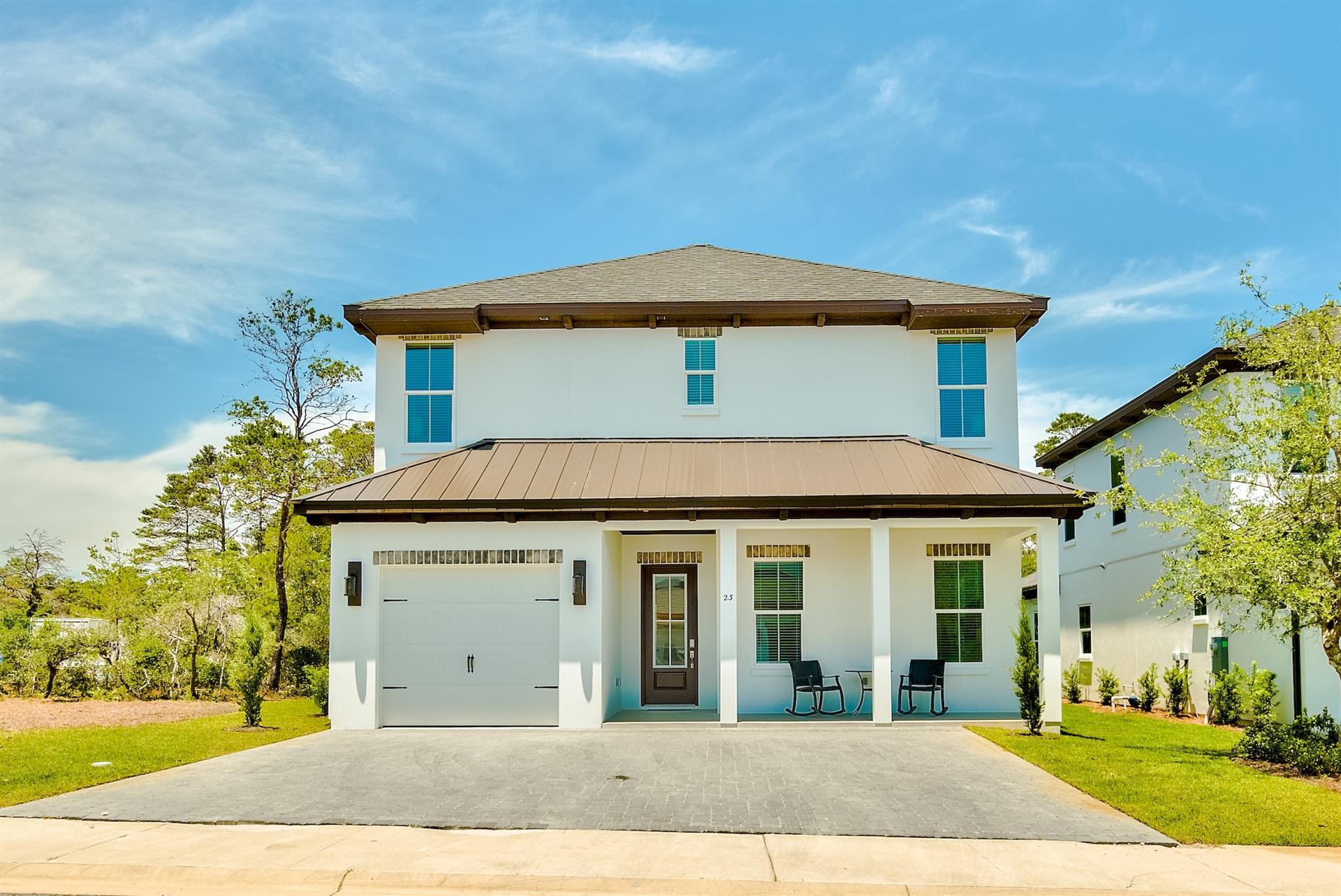 Talk about a perfect location - Welcome to Carefree L'Attitude! This home is walking distance to the beach and tucked away on a corner lot for those looking for more privacy. The home has TWO master bedrooms, one on each floor, two guest bedrooms and a custom bunk space on the second level. Shiplap accent walls, upgraded appliances, and professionally decorated designer furnishings highlight the interior of this home. An ideal investment opportunity with a proven rental history exceeding $90K in its first year and actual gross rental income of $99K this year from a local management company with multiple homes on the street.