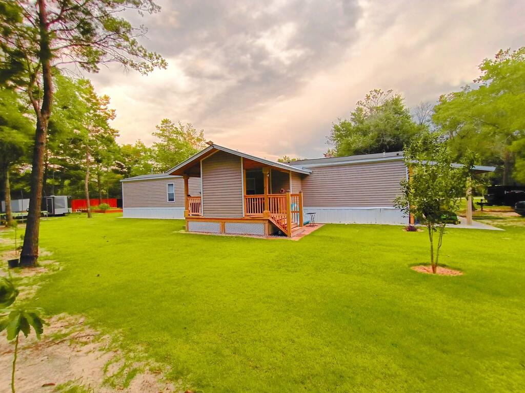 Come and see this impecable Manufacture home with a very clean and well cut grass area in 1 and 1/4 of an acre Well maintain by the original owners Driving distance to highways, shops, and military basesDon'Wait schedule your showing today!