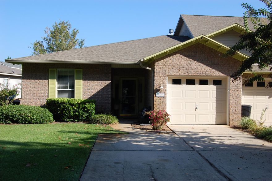 Great Renovated Townhome in Escada. Current owners have kept the unit in immaculate condition . Home has many upgrades including Quartz Counter tops ,Custom solid wood cabinets , Stainless steel appliances and Tiled floors in the Kitchen. The living and dining room have Australian Cypress wood floors. The unit also features a large Master Bedroom and walk in closet . The Master bath features a custom tiled walk in shower and custom made vanity . There are two spacious guest bedrooms and a guest bath with bead board added for a nice touch . The owners have also upgraded the Air Conditioning unit and added an additional six inches of insulation in the attic within the last two years for added energy efficiency . There is also a tiled and screened in covered patio for you to enjoy your lake