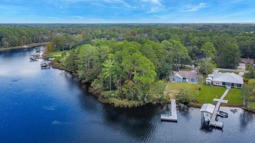 Beautifully wooded 1/2 acre lot on Mallet Bayou, only moments to the Choctawhatchee Bay and @10 minutes to 'The Worlds Most Beautiful Beaches'. Build the Waterfront home of your dreams and enjoy the peaceful serenity that Mallet Bayou brings. There are several Magnolia and Live Oak Trees along with many other Native plants that could be saved and could give a new home a Natural, 'Park-like' setting.   City Water and Sewer available, all Connections Fees Due.Buyer to verify all pertinent information.