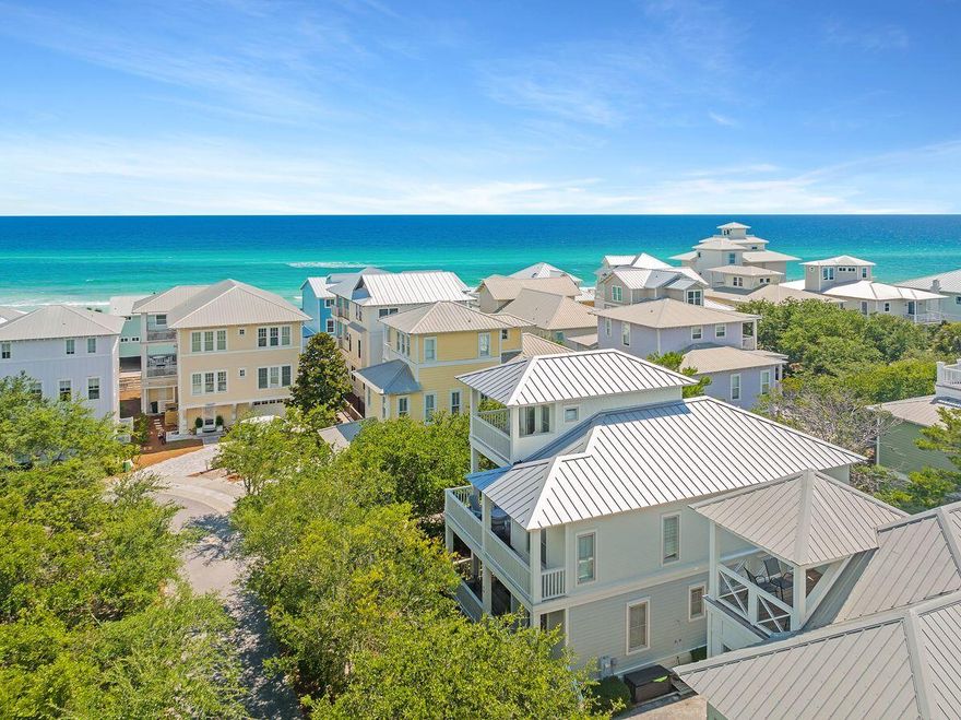 Steps from the beach boardwalk and community pools, this well-appointed beach house maximizes its location with stunning gulf views from the upper floors. This home includes tasteful furnishings which have been recently replaced and comes with deeded beach access. A generous driveway provides ample parking for visiting guests and friends. Recently updated, this beach retreat has many attractive features including terraces on all levels and updated kitchen and bathrooms. The third-floor tower room is a hideaway for youngsters who get their own bunk room with a seaside mural and a wet bar for soda and snacks while watching TV. Magnificent sunsets and gulf views can be enjoyed from the upper balcony.