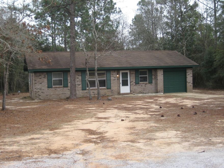 Great all brick 3 bedroom and 1 bath home with a 1 car garage on just shy of an acre! Located close to town and everything on the North end of Crestview. All new flooring within the past 6 months. Perfect starter home or for investment. Don't miss out on this one, rare find all brick at this price!