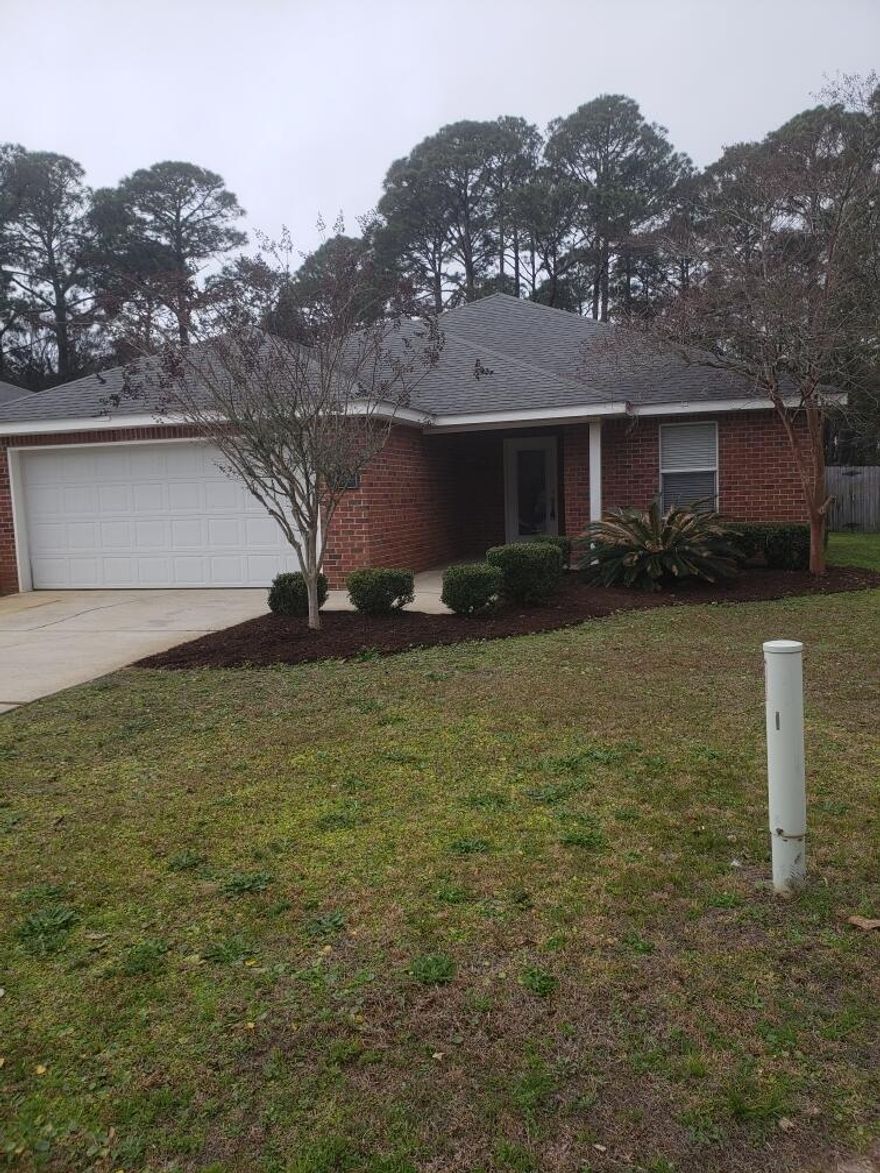 Come see this beautiful home minutes from Hurlburt Fields main gate and convenient to Eglin AFB as well. 4 bedrooms, 2 full bathrooms and a 2-car garage located on dead end road. Open floor plan with Pergo flooring and tile throughout. Kitchen has pantry, stainless steel appliances, breakfast bar and designer cabinets. Master bedroom has a walk-in closet and double granite sinks in the bathroom.  Florida room on back of home for lovely mornings/evenings.  Yard is privacy fenced and equipped with a lawn pump and sprinkler system. This home backs up to the Reserve for additional privacy.
