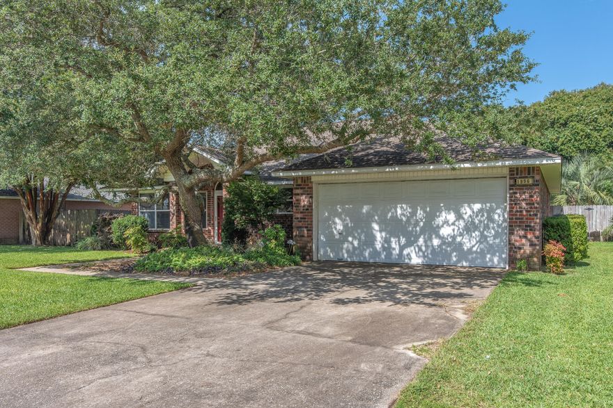 What a FABULOUS find in this WATERFRONT neighborhood located in East Navarre! Only steps away from the community beach. A great place to go paddleboarding, kayaking, swimming or sunbathing! This all brick home features an open floor plan with 3 bedrooms, 2 baths, great flex room perfect for a home office/formal dining etc! The spacious kitchen is a cook's dream w/granite, a huge island, walk in pantry, tile backsplash & stainless appliances. A skylight over kitchen island & all the windows brings in an abundance of natural light. The master bath features a double vanity & 2 walk in closets. Other features include crown molding, tile in the main living area, fireplace, a privacy fence, Architectual shingle roof, plywood in the garage for the windows & beautiful Oak Trees. Truly a must see!!