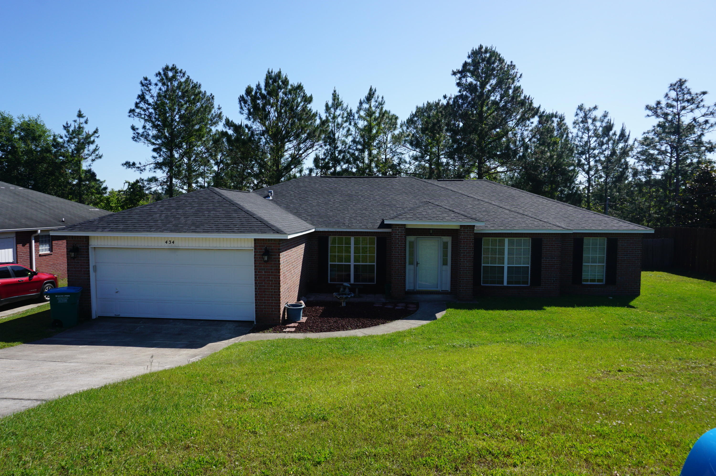 YARD CARE INCLUDED....Available 6/15/2020......South of I-10 home features 3BR/2BA with open floor plan. Office/bonus room can be used as a 4th bedroom. Extra-large great room with new laminate flooring in the living room, dining room, and foyer. Master bedroom with newer carpet and spacious master bath. Separate shower, garden tub, and double vanities. Large kitchen with island, tile flooring, new counters and eat in kitchen area. Formal dining room with new laminate flooring and natural lighting. Office/library is currently used as a 4th bedroom. 2 car garage, screened porch overlooking large fenced back yard. No inside smoking. Pets may be allowed with a $400 nonrefundable pet fee and owner approval. Sorry no cats due to allergies.