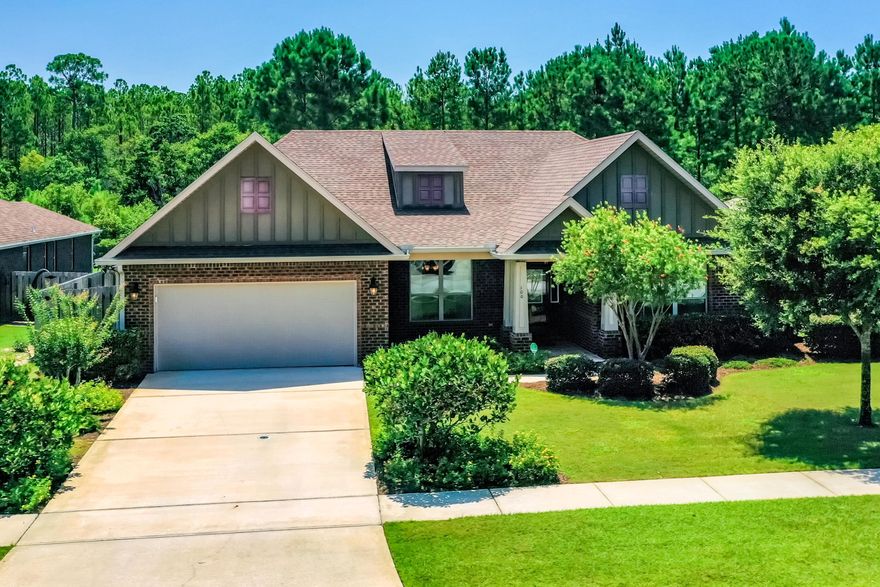 Nicely appointed low maintenance brick home located on a cul de sac.  This LARGE fenced in preserve lot offers privacy and space for a pool! It is loaded with luxury finishes that include: Tempered glass storm door, leaded glass entry door, hardwood flooring in foyer, dining rm and dbl door office/flex/bdr. High ceilings, large windows w/transoms overlooking the back lanai and landscape, crown molding and open floor plan offer a very dramatic look/feel. The spacious kitchen has raised panel cabinets, ss appliances, butlers pantry, tile flooring, recessed lighting, and granite countertops. Adjoining tiled breakfast room opens to the lanai. The mbdr has a large owners retreat/sitting area, trey ceiling w/crown molding. Adjoining mbath has dbl vanity, garden tub, and large custom tile shower.