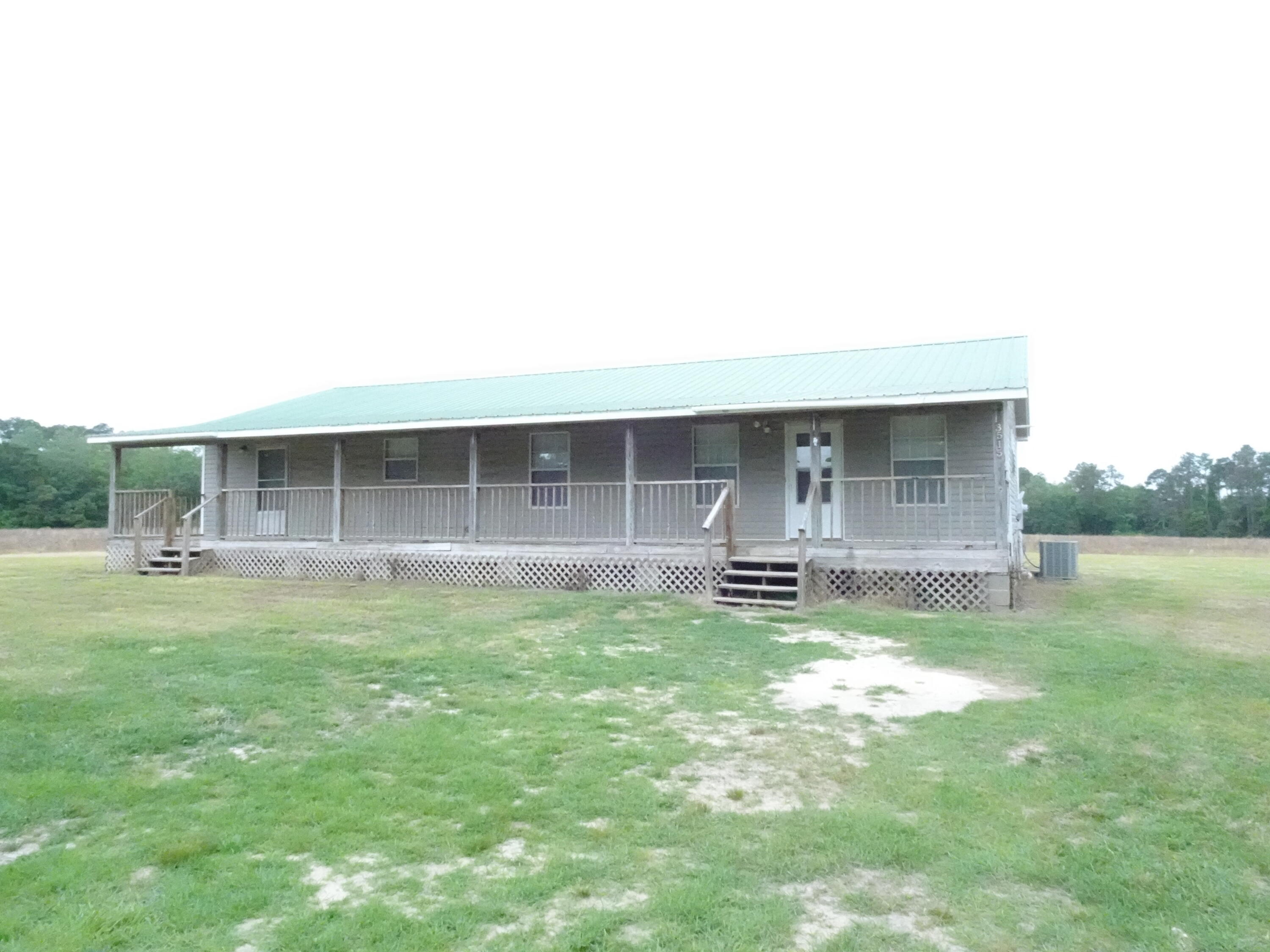 Property is located 17 miles North of DeFuniak Springs in the middle of an active farm which is also leased. Spacious 3 bedroom, 2 bath. Covered front porch as well as screened back porch. Includes a stove and refrigerator. Includes separate laundry room, pantry in kitchen and walk-in closets in bedrooms. Application, proof of income (7 months & 3 times amount of rent), copy of driver's licenses and ss cards for all over 18. Must be submitted prior to viewing property. Restrictions include no hunting or fishing, no pets, no trampolines, no above ground swimming pools or inoperable vehicles. Electricity is Chelco, water is Mossy Head Water, septic tank and propane gas. Tenants must sign a disclosure and release re: farming operation to include chemicals, equipment, noise, dust, etc.