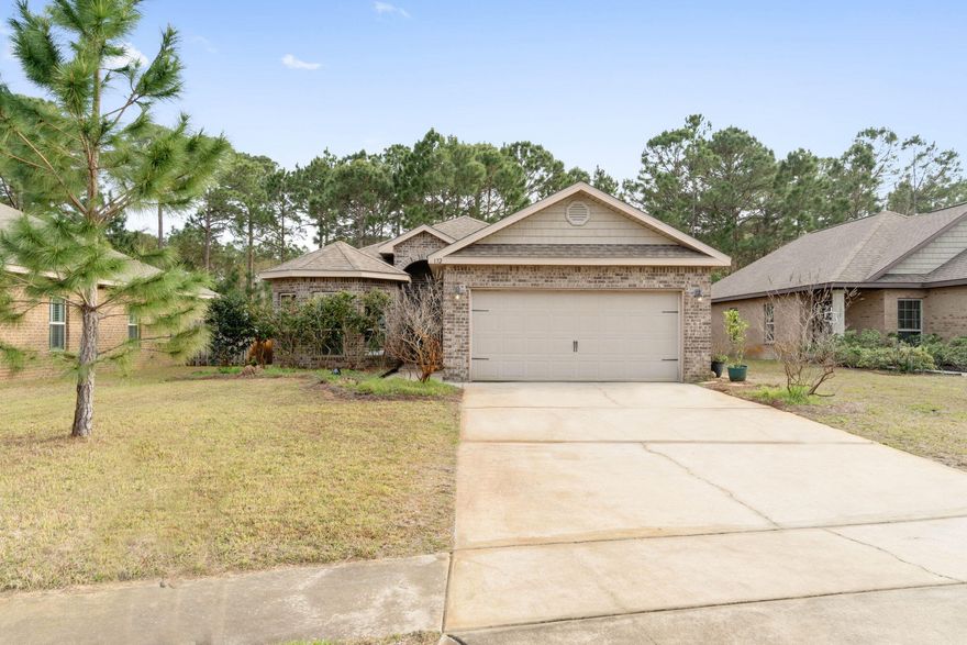 Location, Location, Location! Highly sought after Drift Woods Estate! This home offers 4 bedrooms and 2 baths with a beautiful bay window on the front of the home. PAID OFF SOLAR PANELS. HVAC was replace in 2022, hot water heater was replaced in 2018. Hardwood floors in the foyer, living, kitchen and dining room along with granite in the kitchen and bathrooms. Upgraded tile shower and separate garden tub located in the master bath along with a spacious master closet. Large screen that comes down to screen in garage. Comes with hurricane fabric shields that cover all windows and doors. Front yard irrigation, foam insulation in attic, Backsplash etc...