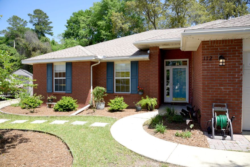 Open House Saturday April 30th from 1:00pm to 4:00pm. Come see this beautiful brick home with an oasis in the back! These homeowners have made this ranch style home into a relaxing and updated place to call home. An open floor plan welcomes you and invites you to spend your warm evenings lounging in the Florida room looking out onto beautiful palms, or roasting marshmallows over the fire pit while you enjoy the covered sitting area. LVP floors sprawl through the home making it feel open and airy, while updated bathroom fixtures and primary bath barn door add a modern feel. If you're looking for some fun activities, you barely have to leave your back gate to access the wonderful amenities of this location. Baseball fields, tennis courts, skate park, and library are just a few of the options available to you! Garage refrigerator will not convey, new roof 2019. Don't wait, this one will not last!