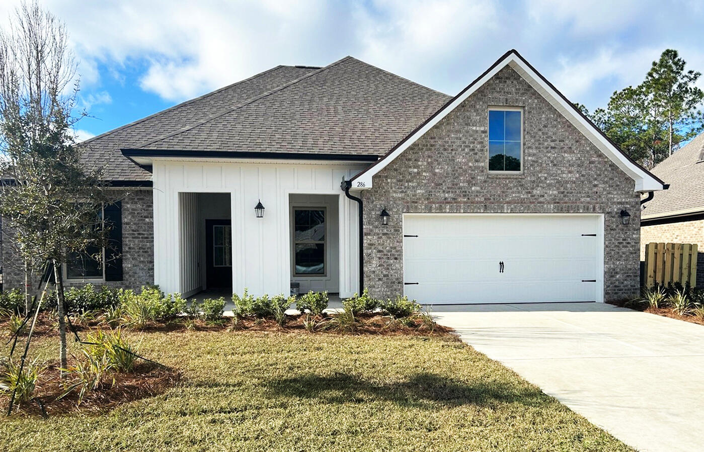 Awesome builder rate plus FREE window blinds. Restrictions apply.The HICKORY III G in Starburst at Hammock Bay community offers a 5BR, 3BA open design with formal dining room and separate den. Upgrades added (list attached). Features: double vanity, garden tub, separate custom tiled shower, and walk-in closet in master bath, kitchen island, walk-in pantry, boot bench at garage entry, covered porches, crown molding, recessed lighting, smart connect Wi-Fi thermostat, smoke/carbon monoxide detectors, landscaping package, architectural 30-year shingles, flood lights, and more!Energy Efficient Features: water heater, electric kitchen appliance package, vinyl low E windows, & more! Energy Star Partner.