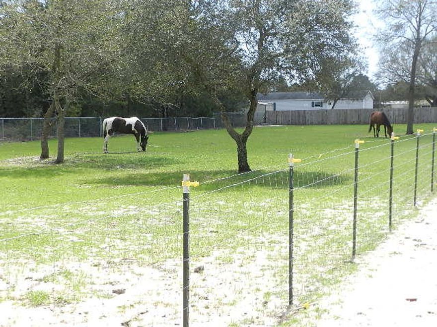 Exceptional 1897 sq ft custom-built brick home. 3 bdrm, 2 bath home with 1.95 acres. 2 stalls, corral, fenced pasture, arena on a High and Dry ridge on East Bay Blvd. This one of a kind property offers both quality and the lifestyle for horse lovers and their horses. Home features: raised 10' ceilings, crown, plant ledges, an open & split floor plan. 5'' base-bds, treyed ceiling, ceiling fans, designer light & Plumbing fixtures; can lights, fireplace, laminate, carpet,& tiled Wet areas. F/D and Dining Room w/kitchen featuring: breakfast bar, upgraded stainless steel appliance package. Walk-in closets in bdrms; whirlpool tub, separate shower, private water closet, and linen closet in bdrm 1. Exterior: Stable, fence acre, barrel racing & corral, grazing pasture,covered patio and more.