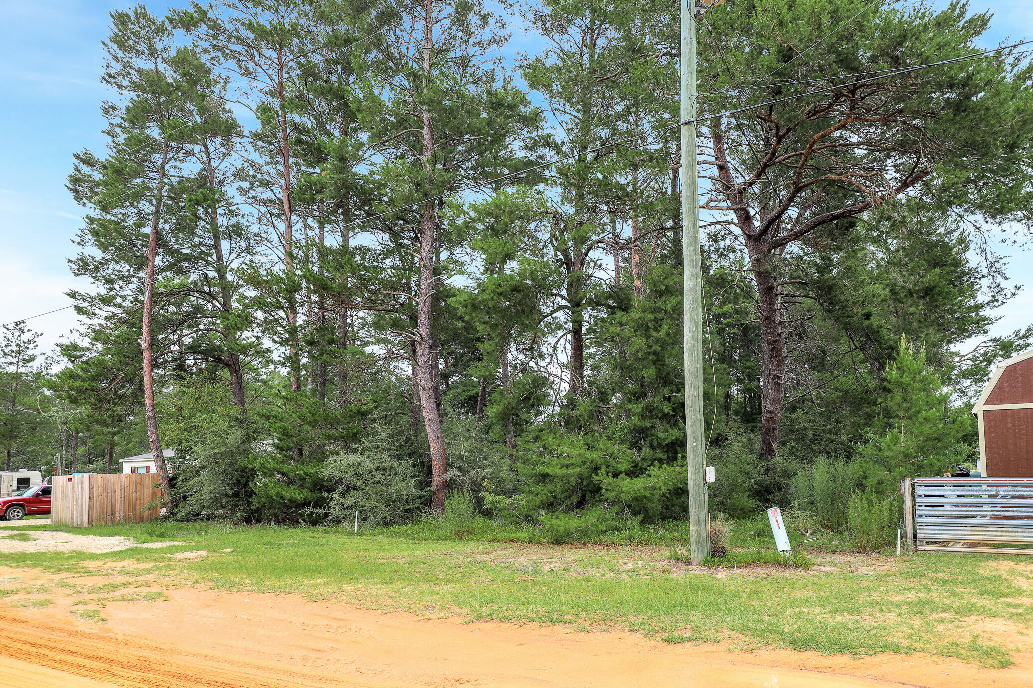 Build your getaway home or place a mobile home with no HOA fees! Vacant wooded lot 0.23 of an acre in size with convenient access to main highways. (HWY 90, I-10, 285, and 331). Less than one (1) mile from HWY 90.This property is near many great outdoor activities like fishing, golfing, national parks, and the beautiful beaches of the Emerald Coast! (Close by popular cities: Niceville, Crestview, Fort Walton Beach, Destin Florida, 30A / Seaside, and Panama City Beach) While no utilities are currently in place on the lot, power and public water are available in the area, and a septic system would need to be installed for sewer service.Gps locationhttps://maps.app.goo.gl/1S8raYzrQmyk5Qcr8