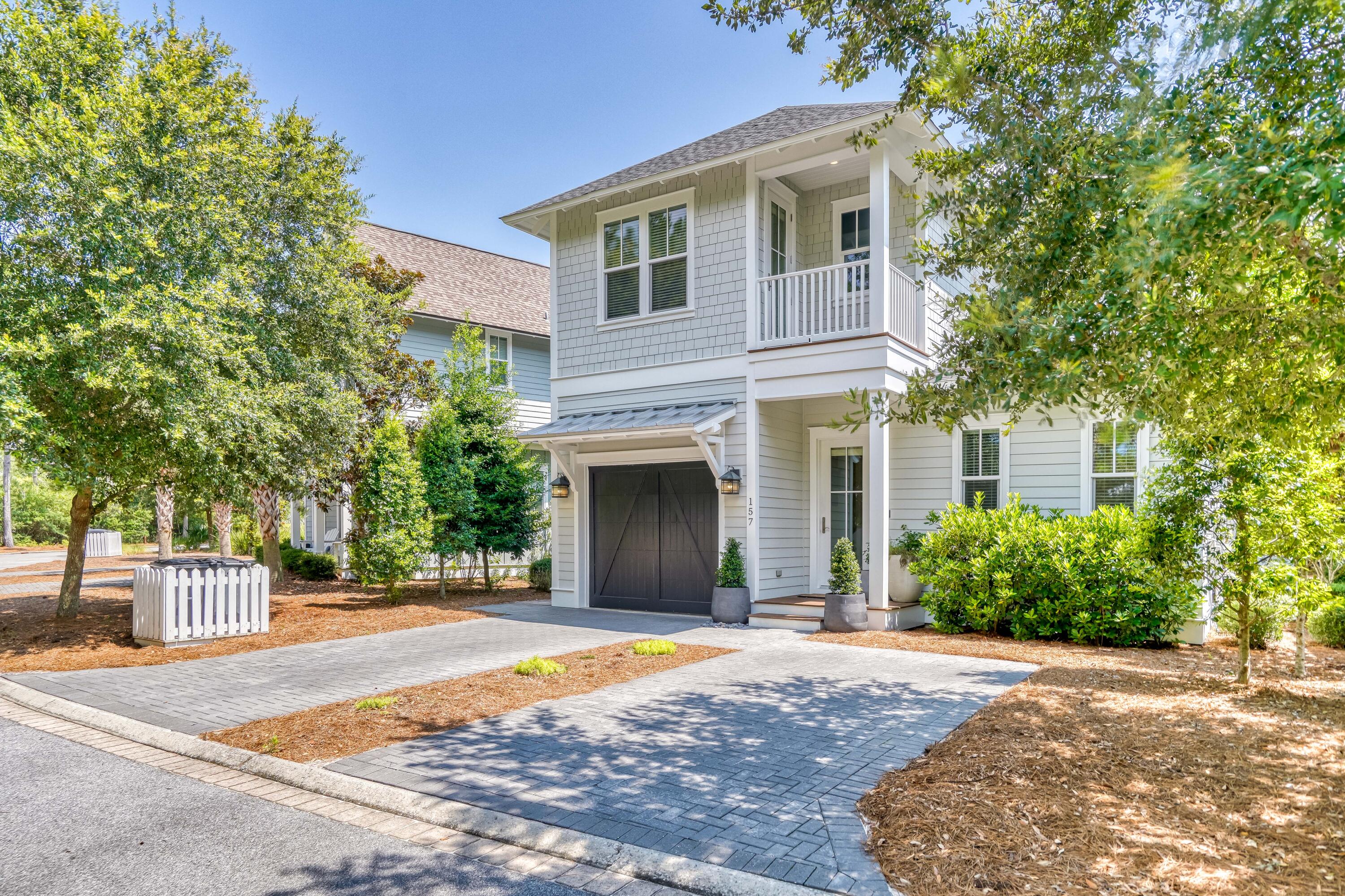 A beautiful, private WaterSound West Beach retreat that offers 4 bedrooms + bunk room/office, 3.5 bath, with a front porch facing green space and double back porches overlooking the quiet, idyllic Horseshoe Park. All this within close proximity of the private community beach access. Features include 10 foot ceilings on main level, sound system with in-ceiling speakers,hardwood floors, shiplap in hall/entry foyer area, custom cabinetry with easy glide doors/drawers, under cabinet lighting in kitchen, and stainless steel KitchenAid Appliances. Single owner and never rented, this house has 3 master-size bedrooms. Junior master bedroom on main level, the second level offers master bedroom, additional oversized bedroom, a guest bedroom, and a bunk room/office.