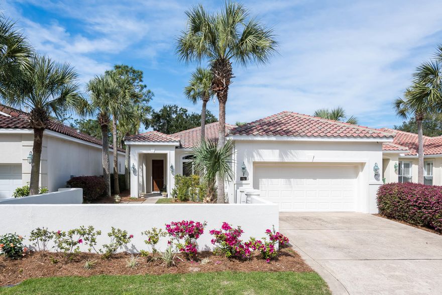 Tucked away on a quiet street in Legend Creek at Sandestin Golf & Beach Resort, this single story, three-bedroom Mediterranean style home greets guests with a manicured courtyard and welcoming covered front porch. Boasting beautiful wood floors and transom windows that flood the space with natural light, this home offers an open concept great room with a gas fireplace that was made to entertain. The fully updated kitchen features stainless steel appliances, a breakfast bar peninsula with seating for three and modern pendant lighting. A large covered back porch compliments the spacious, landscaped back yard. The expansive master suite features an attached bath with a tile shower, dual vanities and direct access to the covered back porch.