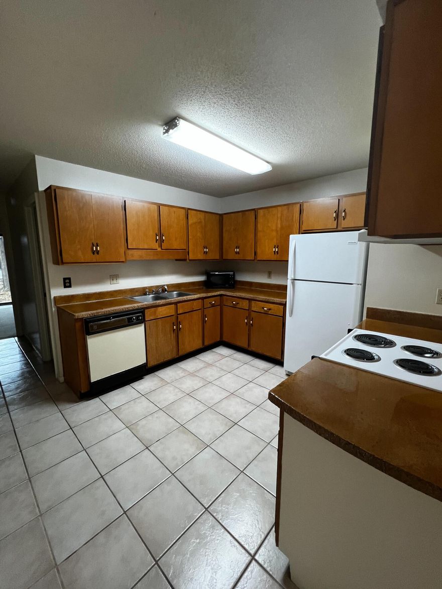 NICE TWO STORY TOWNHOMES. TWO BEDROOMS, ONE UPSTAIRS, ONE DOWN. CENTRALLY LOCATED TO BOTH BASES. W/D HOOKUPS.  New flooring upstairs and tile flooring bottom floor, new paint!
 No Pets and No Smoking