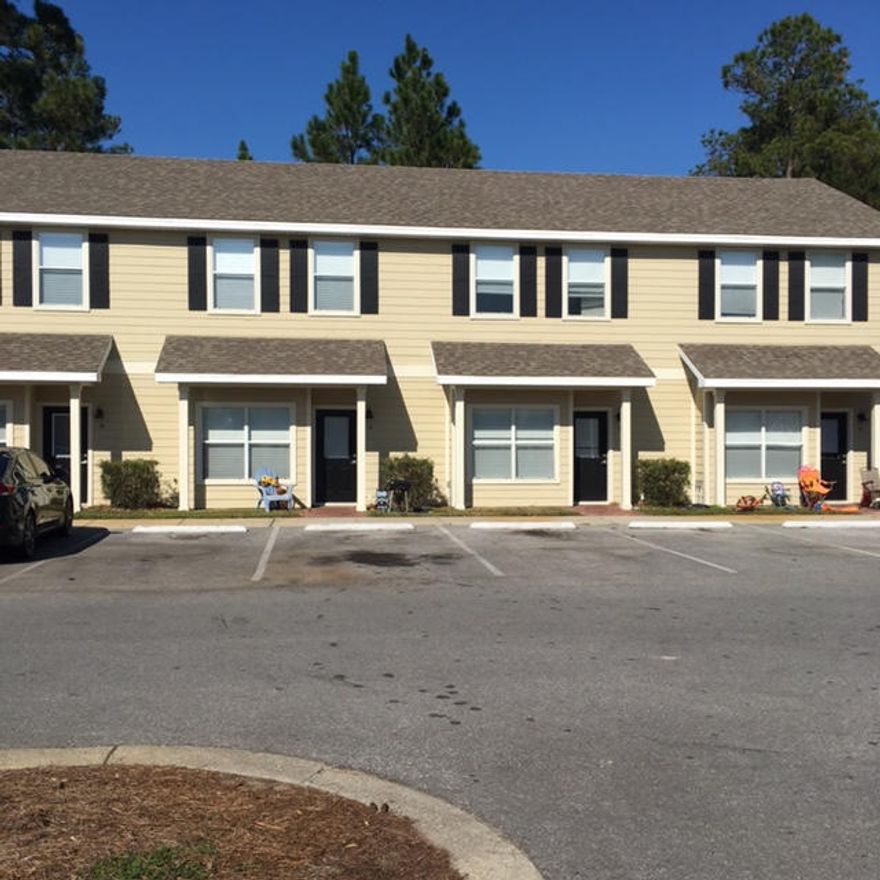 Completely updated. New Laminate wood floors throughout, New Range, New Refrigerator and Washer and Dryer. All new interior paint and Move-in Ready. Two Bedroom Townhouse at Palms of Freeport available now. This two-story townhome is conveniently located in the City of Freeport. Freeport Schools and neighborhood amenities with the New Publix Shopping Center just under 2 miles away. The Palms offers a community pool. Pets on approval, restrictions apply.