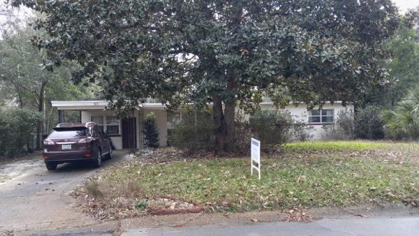This charming older neighborhood in Fort Walton Beach has remodeled homes and some new construction. It is very convenient to everything downtown. The seller has lived in this home since 1973. The garage was converted to a room. the back yard is very big and fenced. There is a gorgeous magnolia tree in the front yard. With some tlc and remodeling this can be a very livable home. Being sold AS IS and the dimensions are not verified.