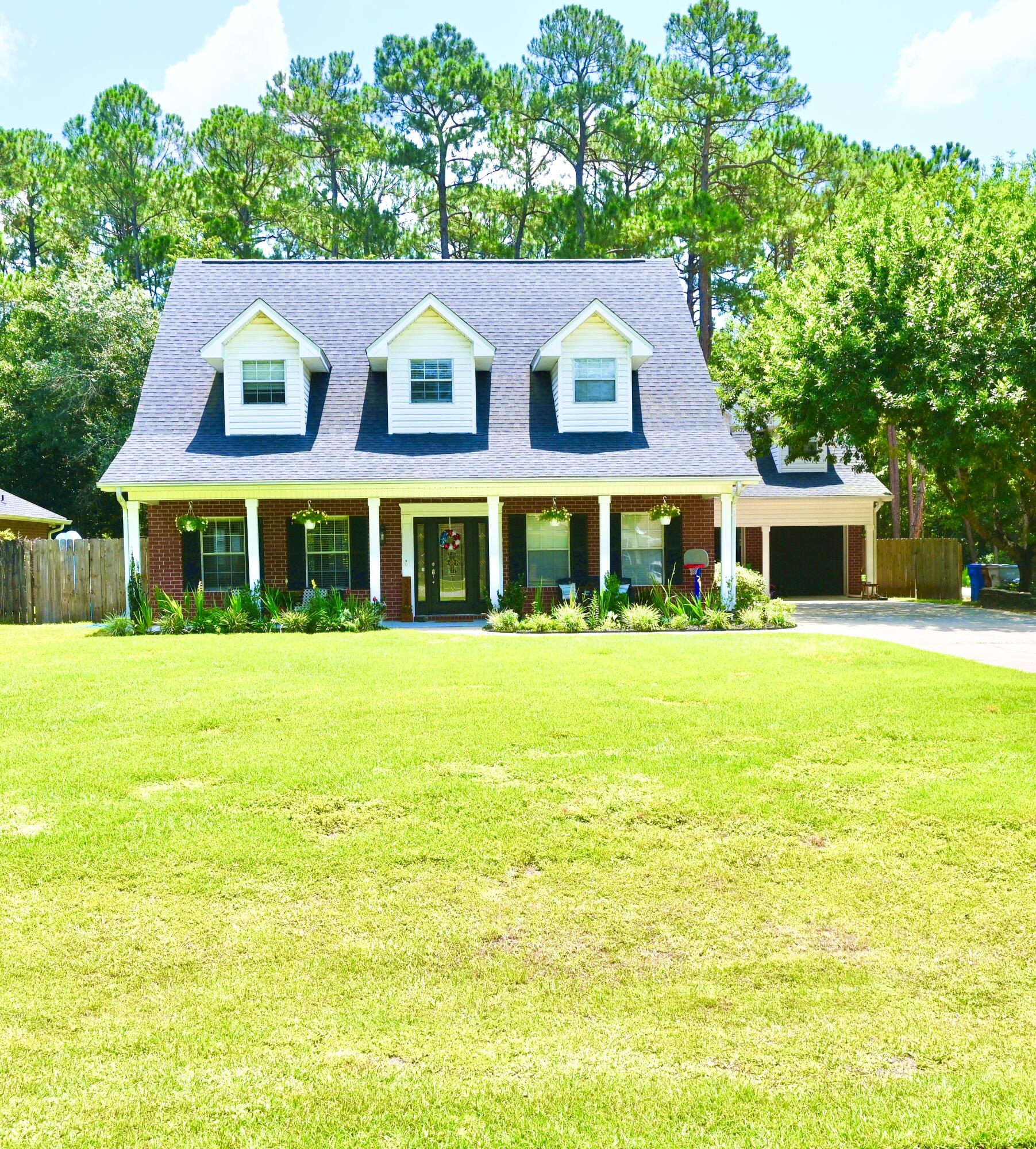 Check out the southern charm and curb appeal on this gorgeous and meticulously maintained home in the gated community of Bernath Place. This home has an abundance light throughout and plenty of space and storage situated on almost a 1/2 acre of land in a neighborhood with deeded water access on Mulatto Bayou. Bring your boat, kayak or SUP to launch from the community launch and enjoy fishing from the pier. Plenty of room on this lot to build your own pool and make your outdoor dreams come to life. Property goes beyond fence line in backyard that is wooded and private. Located in Milton, FL and is conveniently within 4 miles of Interstate 10. All bedrooms are oversized with the main bedroom on the 1st floor and the upstairs guest bedrooms being oversized with large walk-in closets, and wood beams adorn the vaulted ceilings. Main and guest bathrooms are oversized and both have double vanities. Open kitchen with plenty of storage as well as a large walk-in pantry for additional storage. Upstairs there is an office and an entire oversized bonus room over the garage for your imagination to create and use in a variety of ways with an extra exit and staircase leading to the 2 car garage. Loads of storage space with access to walk-in attic space, overhead attic space, outside storage closets and extra garage storage space. Call today to schedule a private tour of this beautiful home.