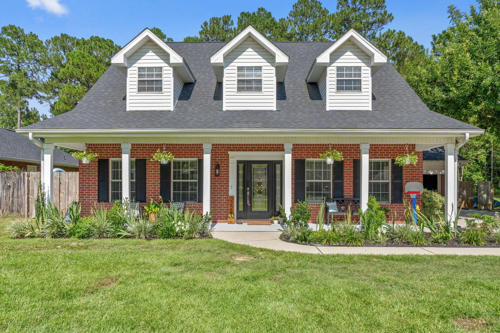 Check out the southern charm and curb appeal on this gorgeous and meticulously maintained home in the gated community of Bernath Place. This home has an abundance light throughout and plenty of space and storage situated on almost a 1/2 acre of land in a neighborhood with deeded water access on Mulatto Bayou. Bring your boat, kayak or SUP to launch from the community launch and enjoy fishing from the pier. Plenty of room on this lot to build your own pool and make your outdoor dreams come to life. Property goes beyond fence line in backyard that is wooded and private. Located in Milton, FL and is conveniently within 4 miles of Interstate 10. All bedrooms are oversized with the main bedroom on the 1st floor and the upstairs guest bedrooms being oversized with large walk-in closets, and wood beams adorn the vaulted ceilings. Main and guest bathrooms are oversized and both have double vanities. Open kitchen with plenty of storage as well as a large walk-in pantry for additional storage. Upstairs there is an office and an entire oversized bonus room over the garage for your imagination to create and use in a variety of ways with an extra exit and staircase leading to the 2 car garage. Loads of storage space with access to walk-in attic space, overhead attic space, outside storage closets and extra garage storage space. Call today to schedule a private tour of this beautiful home.