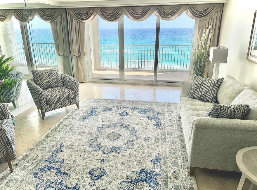 EASY SHOW! RARE! IMMACULATE renovated 2br/2ba Penthouse in RENTAL RESTRICTED Grand Mariner in heart of Destin. New compelling price $755K!  The ultimate in quiet, privacy & comfort in this premier uncrowded gated community-ideal for true 2nd home/family legacy or primary beach living. C703 Grand Mariner offers the best view in the house! Relax and enjoy awe inspiring vistas of sugar white sands & sparkling emerald waters from foyer, Kitchen, LR and MBR too! Travertine tiled LR&Kitchen w/new carpet in BRs. Renovated gourmet kitchen is spacious w/lots of cabinetry, GoldenEagle granite & recessed lights. Laundry closet. Stunning kitchen, LR & gulf-front Master suite views. Private Gulffront balcony has new upgraded hurricane shutters. Hall 2nd bath leads to spacious GBR. Sold unfurn. Master BR with en suite bath is GULF-FRONT with stunning views and flowing natural light from floor to ceiling windows. You'll appreciate all the "extras" in C703 including elegant plantation shutters in both BRs, NEW $19K master bath remodel, new door lock, new kitchen faucet and more! Quality stainless steel appliance package includes Kitchen Aide side by side refrigerator; Jenn-Aire ceramic cooktop, Bosch dishwasher, GE Microwave. Bonus private storage room outside by front door. Listed Unfurnished. Grand Mariner condo offers gated entry, community room, gulf-front pool with large sundeck and bathrooms; fitness center, gated boardwalk w/shower, 2 elevators and onsite mgt. office. Located on 98 directly across from The Track, Morgan Sport Complex and within easy access to entertainment, dining, Destin Airport and all area activities. Walmart is just a few miles away.  Owner pets allowed only. C703 Grand Mariner is your ideal next beach home! VACANT. EASY SHOW!