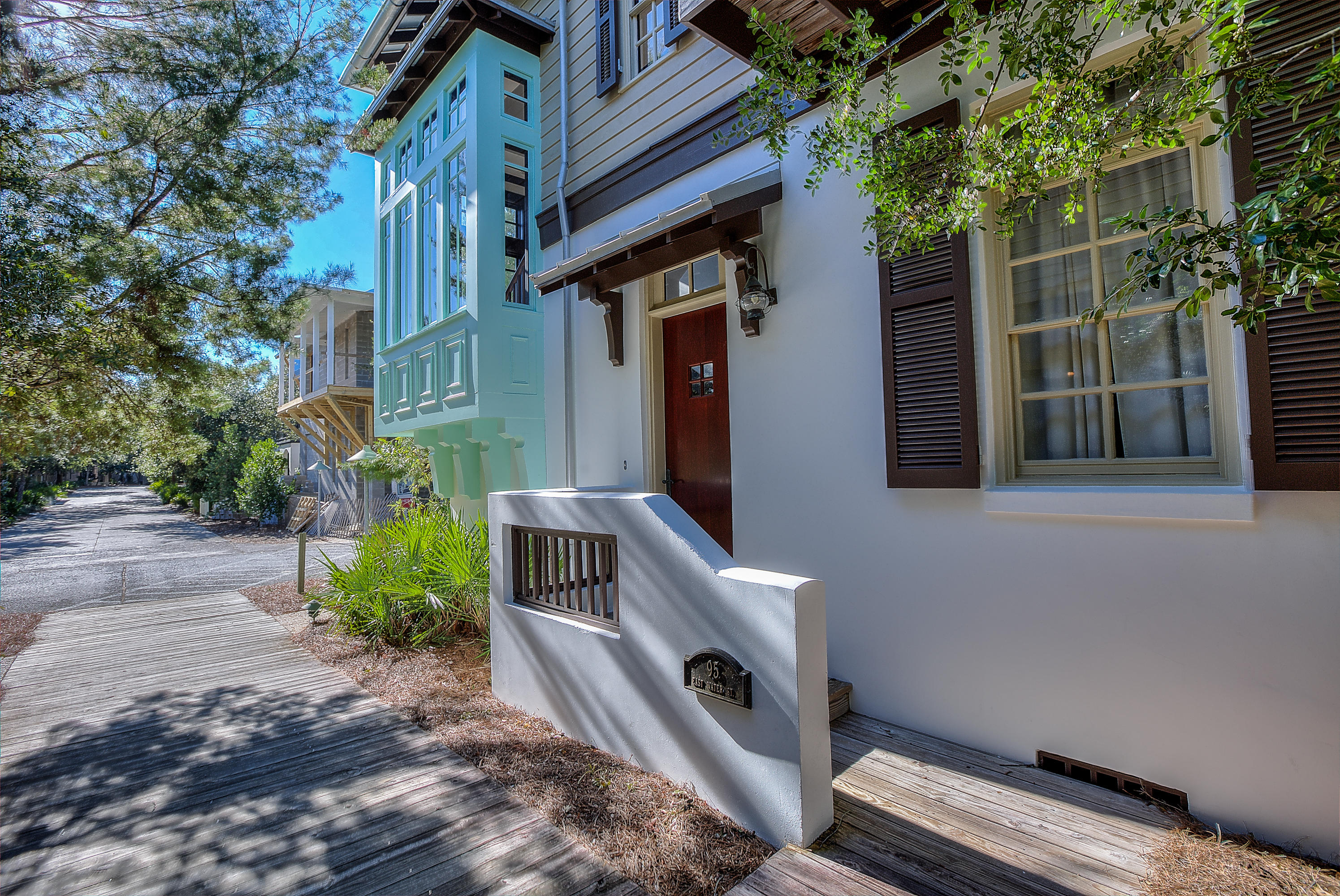 This home has recently added 300 Sq. Ft. to the main floor interior living area which opens to a FABULOUS PRIVATE POOL & COURTYARD AREA. A most perfect INDOOR and OUTDOOR ENTERTAINING area for you & your guests. On an oversized CORNER LOT and facing the BOARDWALK, it is in a perfect location to stroll to the BEACH and TOWN CENTER. You are right in the middle of PARK SIDE activities and close to FITNESS CENTER, INDOOR/OUTDOOR SKY POOL, & TENNIS CENTER. The main house has 4 bedrooms and 4.5 baths. The LIVING/DINING/KITCHEN are one big open space with wood floors & a ''wall of windows'' creates a light bright living area. The lot has an 1 BR CARRIAGE HOUSE which sleeps 4 and is the perfect place for friends or family. Established rental history. Buyer to verify all dimensions and measurements