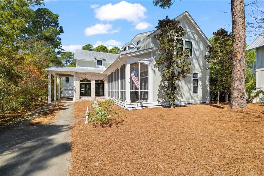 Nestled in the secluded, established Sugarwood Beach community, this exquisite Seagrove home offers the perfect balance of privacy and convenience. Tucked away from the hustle and bustle yet just moments from everything 30A has to offer, you'll enjoy deeded beach access, scenic bike paths, boutique shopping, fine dining, and endless coastal adventures -- all right at your fingertips.Step through the arched brick entry and into a beautifully crafted home where thoughtful design meets timeless charm. Designed by Chris Stoyles, this masterpiece features stunning 6'' white oak flooring, shiplap walls, and custom solid quarter doors, creating a warm and inviting atmosphere. The open-concept kitchen, dining, and great room flow effortlessly, with a cozy sitting area anchored by a fireplace and soaring 23' vaulted ceilings. The kitchen boasts Carrara marble countertops, ample cabinet space, a farmhouse sink, and large windows that flood the space with natural light.

The first-floor master suite is a peaceful retreat, complete with a spa-like ensuite bath. Upstairs, you'll find two additional bedrooms with ensuite baths, plus a cozy sitting area for added relaxation. The expansive 760 SF carriage house provides a private and comfortable space for guests, featuring hardwood floors, marble counters, ceiling fans, a living area, a kitchen with a two-burner stove and microwave, a bathroom with a shower, and ample storage. Below, a spacious two-car garage doubles as a potential workspace, offering both functionality and versatility.

This home is equipped with a Generac generator and benefits from a 70' deep well for irrigation, ensuring efficiency and convenience. Situated on a generous lot, the property also features expansive screened porches and a private backyard perfect for unwinding or entertaining. The lot is large enough to accommodate a private pool, making the possibilities endless. The main home is equipped with three AC units, while the carriage house has it's own dedicated unit to ensure guests' comfort.

This exceptional property truly embodies the essence of 30A living, where luxury and coastal charm come together in perfect harmony. Contact us today for a private tour and experience this remarkable home firsthand.
