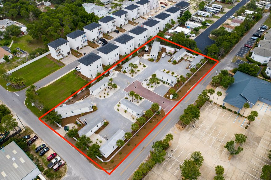 With an average review of 4.8 stars, plus 2018 gross rental income of 224K and 2019 of 213K, this income-generating property is a must see! The 10-unit community is beautifully landscaped and each cottage has been well-maintained with upgrades to kitchens and bathrooms in late 2019. There are 8 one-bedroom, one bathroom (396 square feet, sleeps 4) and 2 two bedroom, one bathroom (728 square feet, sleeps 6) modular built cottages. All cottages have a full kitchen, walk-in shower, sleeper sofa, dining area and A/C. Each cottage has a private sitting porch, dedicated parking space, outdoor grill, picnic table, Direct TV and high-speed wireless internet. There is potential for a buyer to remove the existing cottages and built 10 single-family dwellings. Buyer to verify all information.