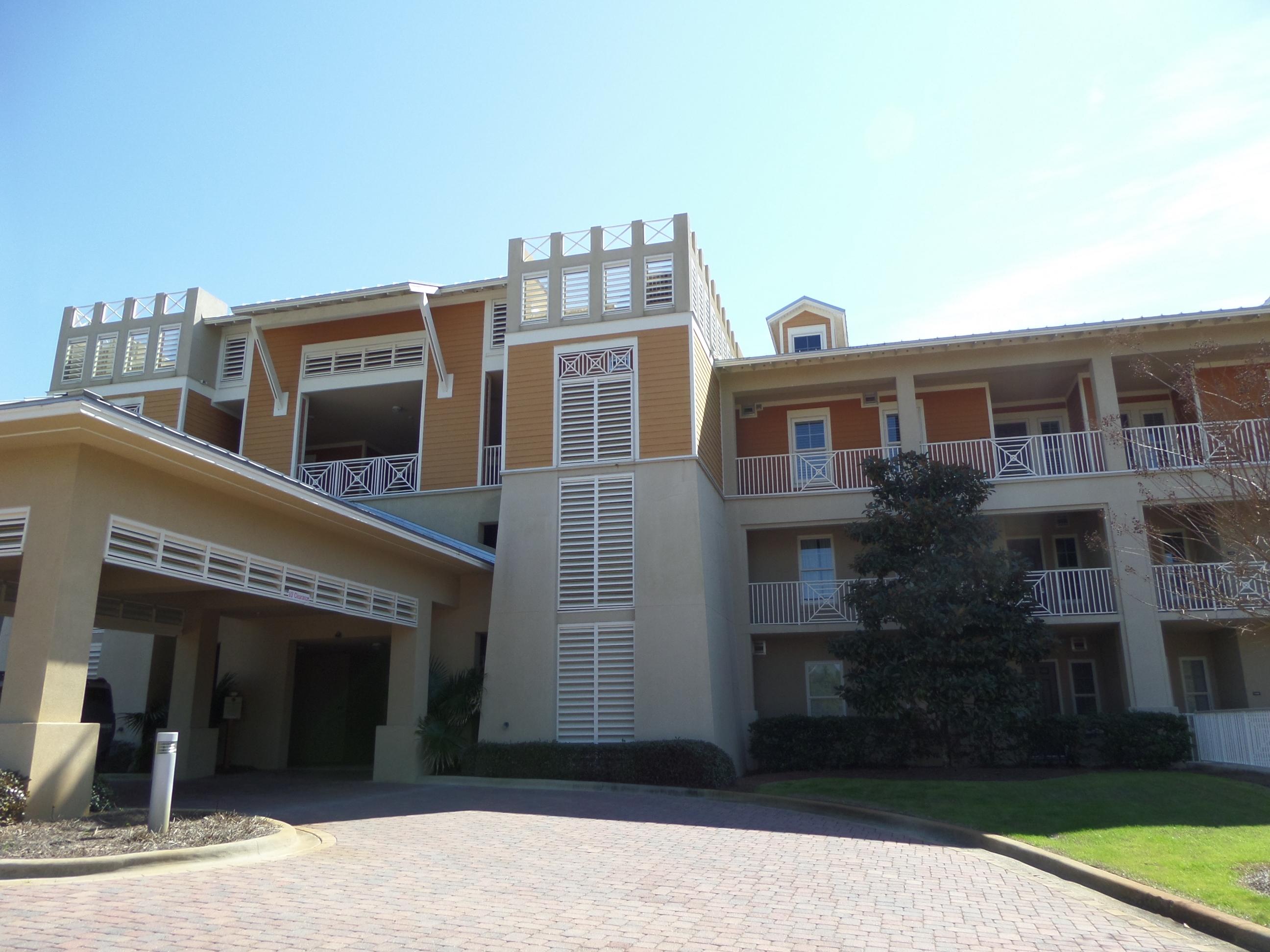 This beautiful 2nd floor 3 bedroom 3.5 bath condo enjoys both gulf and lake views! The unit boasts traveritne floors in the kitchen and baths, granite counter tops and stainless steel GE Profile appliances. The kitchen opens to the large dining/living room with gas fireplace across a large breakfast bar. The spacious Master Suite has its own balcony access, walk in closet, a whirlpool tub, walk in shower and double vanity. The other 2 bedrooms also have en suite baths. Amenities abound in The Sanctuary at Redfish, including: fitness center, 4 gorgeous lagoon pools, 2 hot tubs, security gate, underground parking, and trolley boat access to the beach. Come make your dream of living at the beach a reality!!