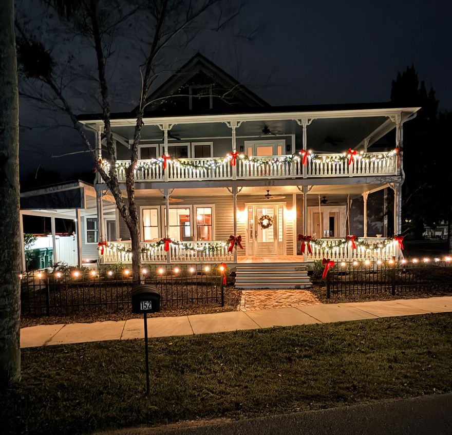 Welcome to this fully restored 1888 architectural gem blending historic charm with modern luxury, located in the heart of a thriving community poised for thoughtful growth. Originally constructed during DeFuniak Springs' founding era and once home to renowned University of Kentucky professor Robert McKnight, this one-of-a-kind residence has been meticulously reimagined with no expense spared. Spanning over 4,625 square feet of cooled living space across three beautifully finished levels, the main home features 5 bedrooms plus a large bonus room, 3.5 bathrooms, and is already plumbed for an additional full bath and half bath on the third floor. Interior upgrades include premium wood flooring, soundproof wool insulation, state-of-the-art kitchen appliances with gas range and hood, 2 laundry rooms, and a high-end Menco fireplace with dual remotes, all framed with 2x6" construction for added strength, insulation, and soundproofingeven between interior rooms and ceilings. Enjoy outdoor living like never before with over 1,250 square feet of covered porches plus a 450 sq ft rooftop deck perfect for sunset viewing or future conversion into a rail-protected entertainment space. And for true Florida relaxation, take a dip in the custom guitar-shaped gunite pool, a nod to DeFuniak Springs' growing reputation as a North Florida music hub. This themed pool is both a showpiece and a private retreat, ideal for entertaining or unwinding under the stars. Every exterior door and window is top-of-the-line in quality, security, and soundproofing, and the NASA-donated roof insulation paired with a whole-home dehumidifier ensures year-round comfort and energy efficiency. The fully restored Carriage House, approximately 600 sq ft across two levels (uncooled but newly wired and lit), features a new concrete foundation, roof deck, and high-heat peel-and-seal metal roofing. It's primed for additional finished space, studio, or guest retreat potential. Safety and technology enhancements abound with five security cameras with lights and alarms, wall humidity sensors, a sprinkler system across all levels (currently dry for safety), and speaker wiring throughout. Additional highlights include premium kitchen cabinetry, built-ins, tankless water heater, Bidet-style commode, period-correct black gutters and downspouts, and a landscaped, fenced backyard with security gates and keyed access.
Located just steps from Baldwin Avenue's vibrant arts and music scenehelped brought to life by this home's former ownerand close to Circle Lake, this iconic property is more than just a home; it's a landmark of craftsmanship, love, and legacy. Don't miss the view of one of two almost perfectly circular spring fed lakes in the world! Whether you're seeking a historic homestead, a show-stopping vacation rental, or an inspiring creative retreat, this property delivers unmatched quality, history, and soul.