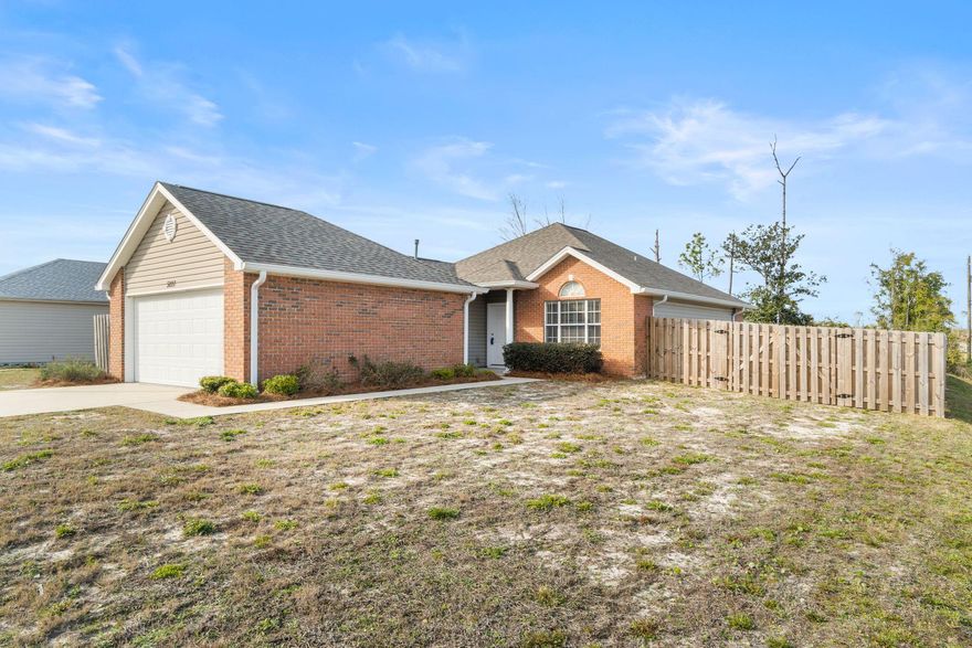 Fantastically maintained single family brick home with modern finishes, spacious split bedroom floor plan that's perfectly located in the heart of Callaway for easy access to HWY 98 and Tyndall AFB.  The many updates include: NEW CARPET 2021, NEW GARAGE DOOR 2021, NEW ROOF 2019, NEW WATER HEATER 2019, NEW REFRIGERATOR 2018, dishwasher under 5 years old.  The living room has a vaulted ceiling, gas fireplace in the corner and a glass sliding door giving access to a covered porch and the back yard's awesome fire pit. Large kitchen/dining area with stainless steel appliances, ceramic tile floors, plenty of cabinet space and a family size eat in kitchen. The master bedroom has a vaulted ceilings and separate master bathroom. Garage is full size with room for 2 cars and access to the attic.