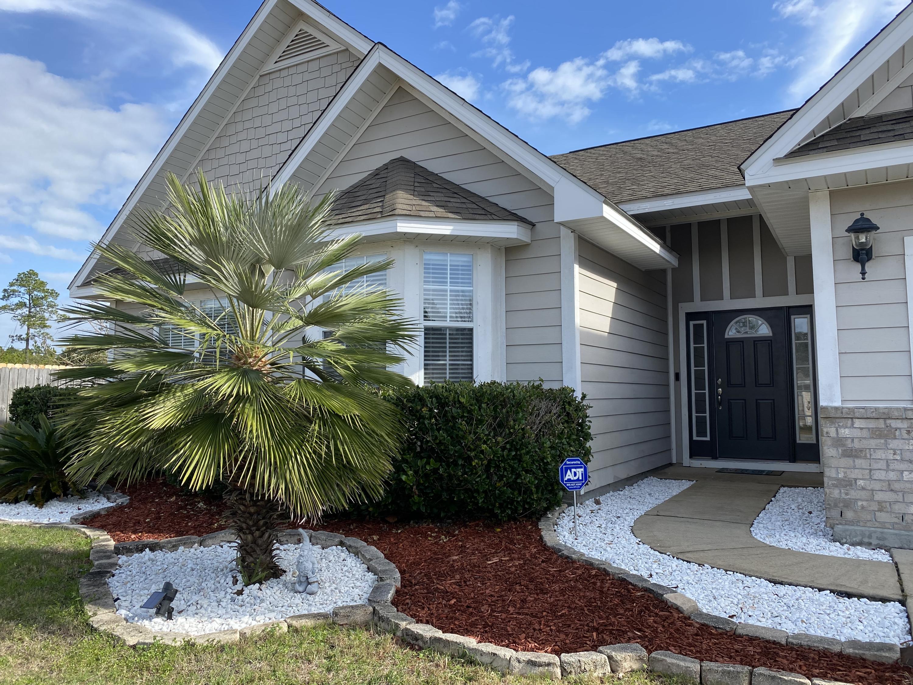 Welcome home to a well taken care of property with lots of curb appeal! From the palm trees, to the rock beds, you will notice that this one owner home is exactly what you have been searching for!The home has a ring door bell, ADT connections, stainless steel appliances, think faux wood blinds, and a screened enclosure out back. The home is also fully fenced and features irrigation for your yard. The yard is dormant during the winter, but in the Spring you will see blooms and pops of color out side. The best part of the home is the tall ceilings and oversized rooms. The formal dining could actually be used as an office space because you have a large eat in kitchen facing the back yard. Schedule your showing today before this affordable choice is gone!
